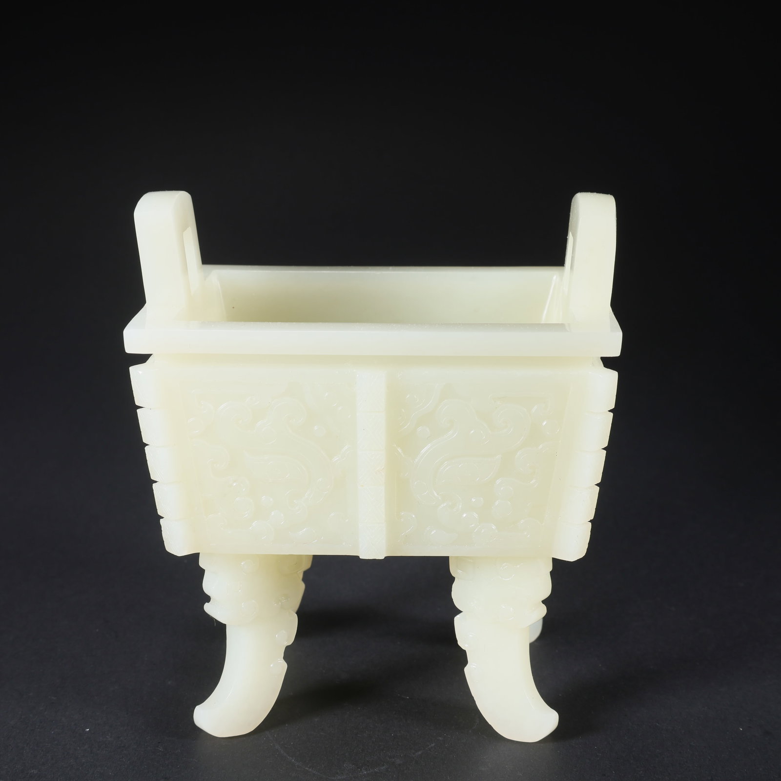 A HETIAN JADE SQUARE DING CENSER WITH BEAST FACES AND FOUR FEET: Hetian Jade Square Ding Censer with Beast Faces and Four Feet