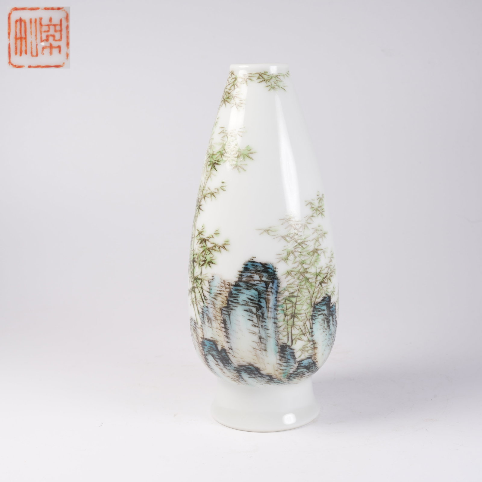 A FAMILLE ROSE BAMBOO-AND-SCHIST PATTERNED OLIVE-SHAPED VASE: Famille rose bamboo-and-schist patterned olive-shaped vase