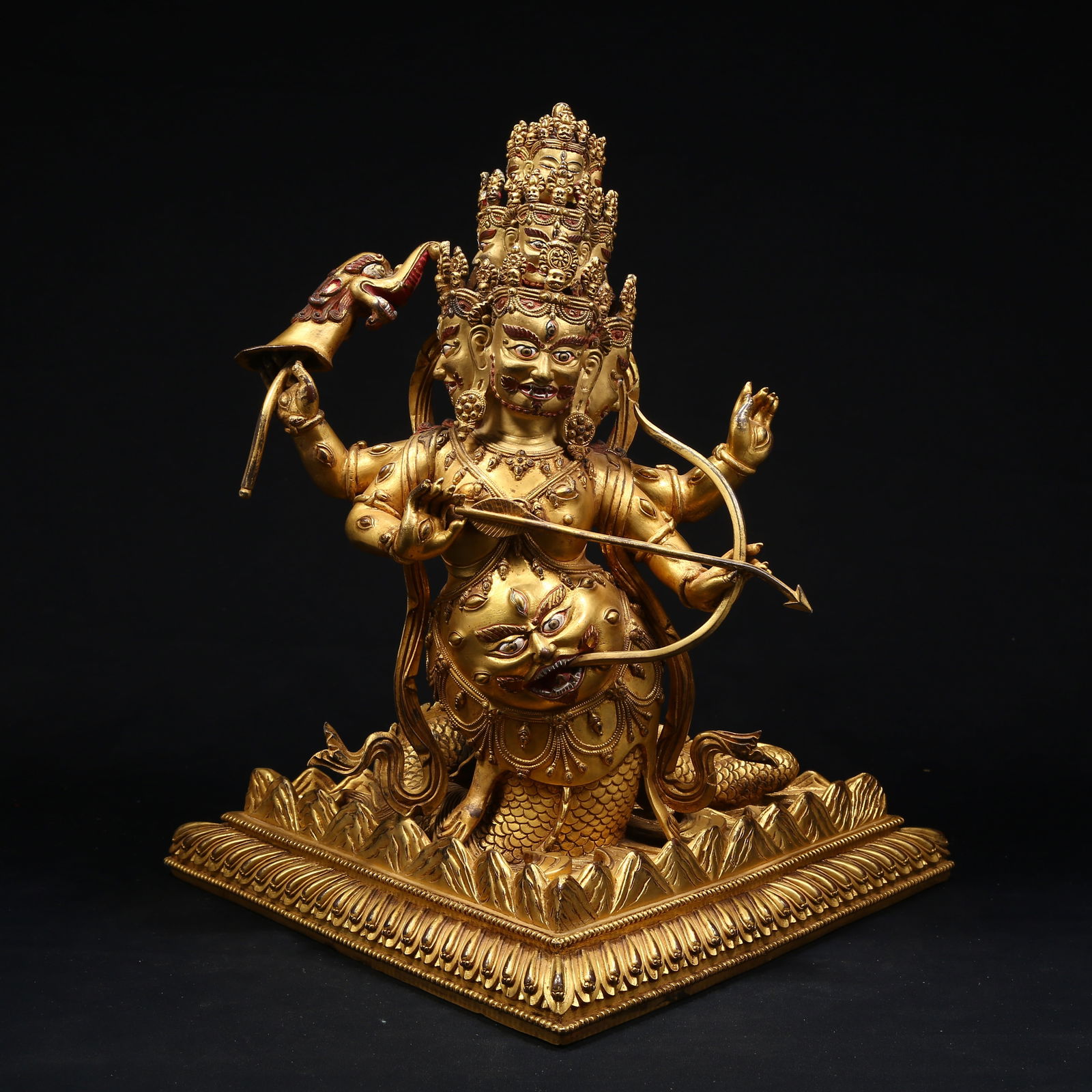 A GILT BRONZE RAHULA PROTECTOR DEITY STATUE: Gilt Bronze Rahula Protector Deity Statue