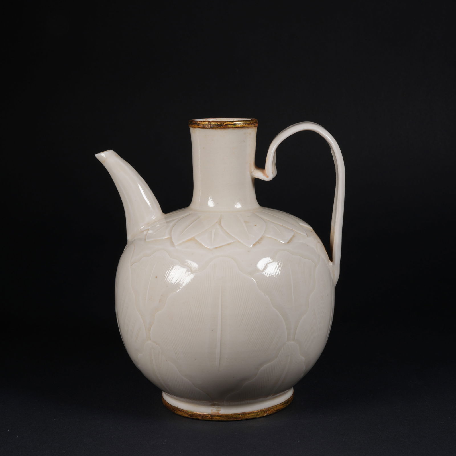 A DING WARE EWER: Ding ware ewer