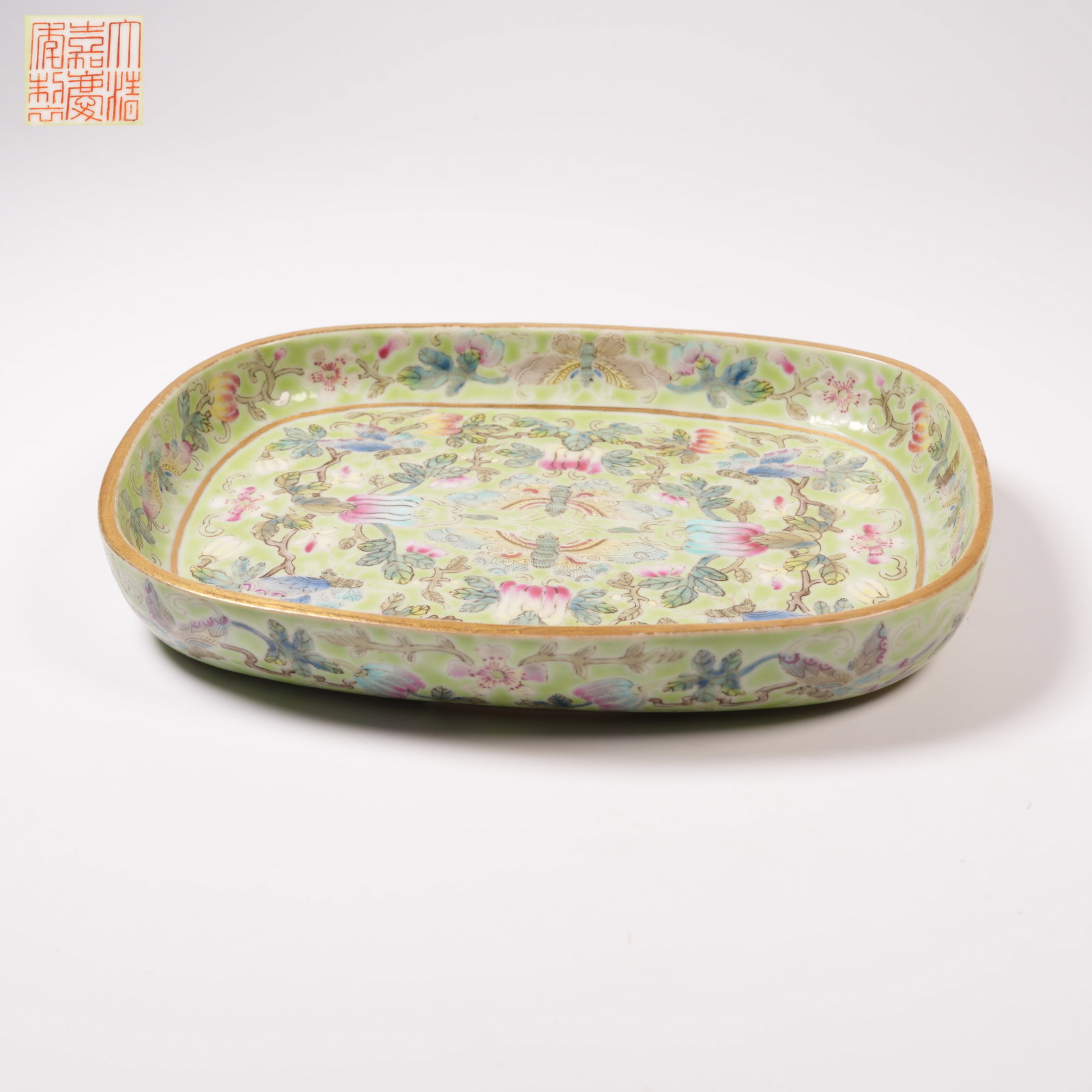 A TURQUOISE-GROUND FAMILLE ROSE BRUSH WASHER WITH FLORAL-AND-BUTTERFLY MOTIF: Turquoise-ground famille rose brush washer with floral-and-butterfly motif