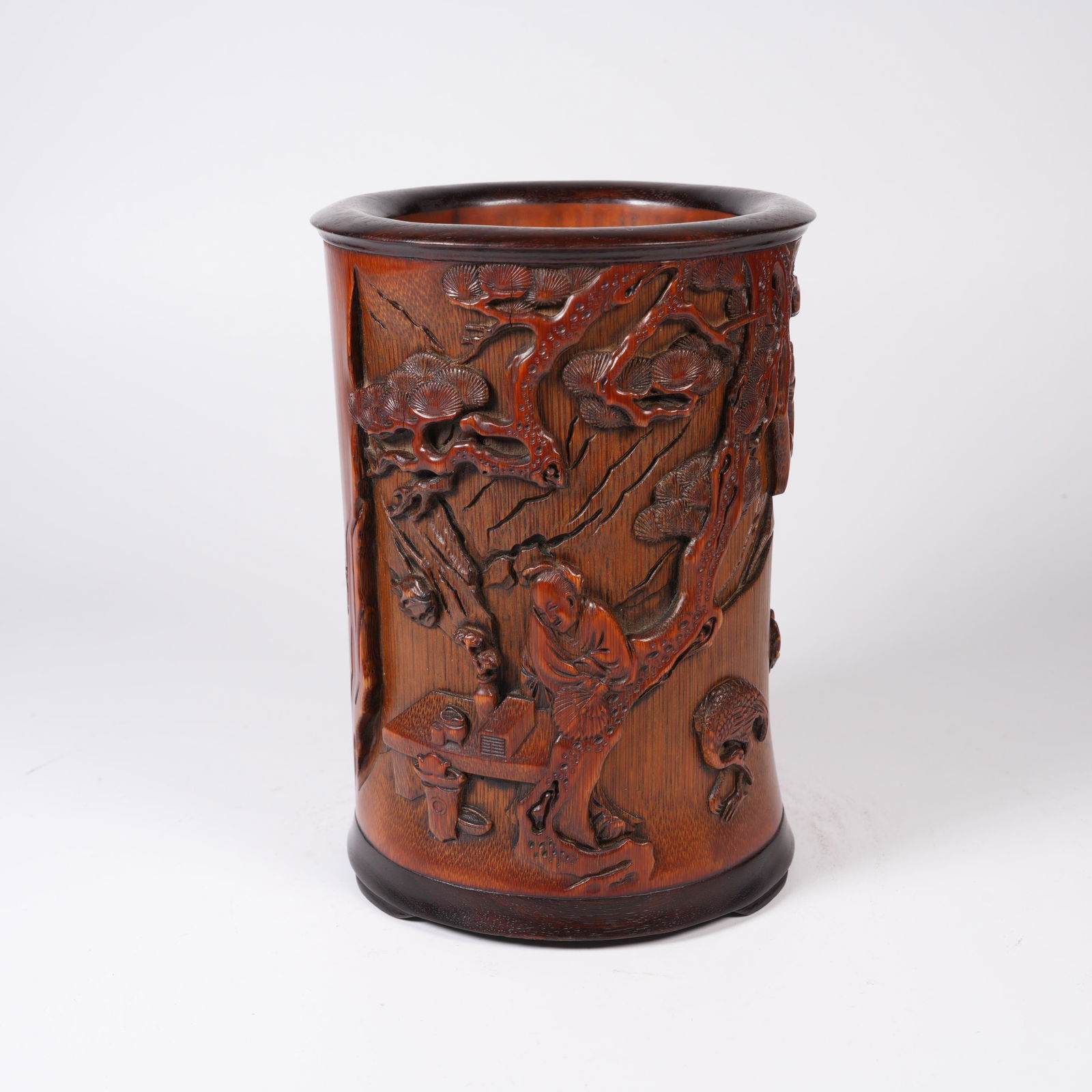 A BAMBOO-ROOT CARVED BRUSH POT WITH FIGURES UNDER PINE MOTIF (1 of 10)