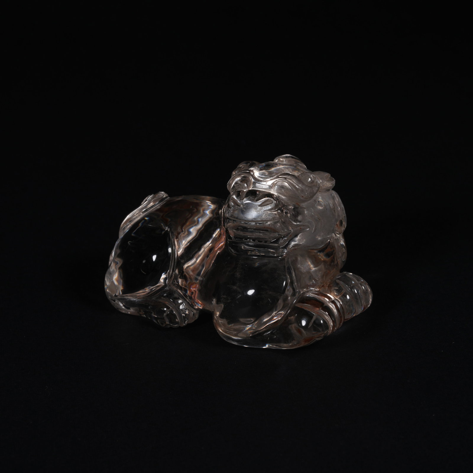 A CRYSTAL MYTHICAL-BEAST PAPERWEIGHT: Crystal mythical-beast paperweight