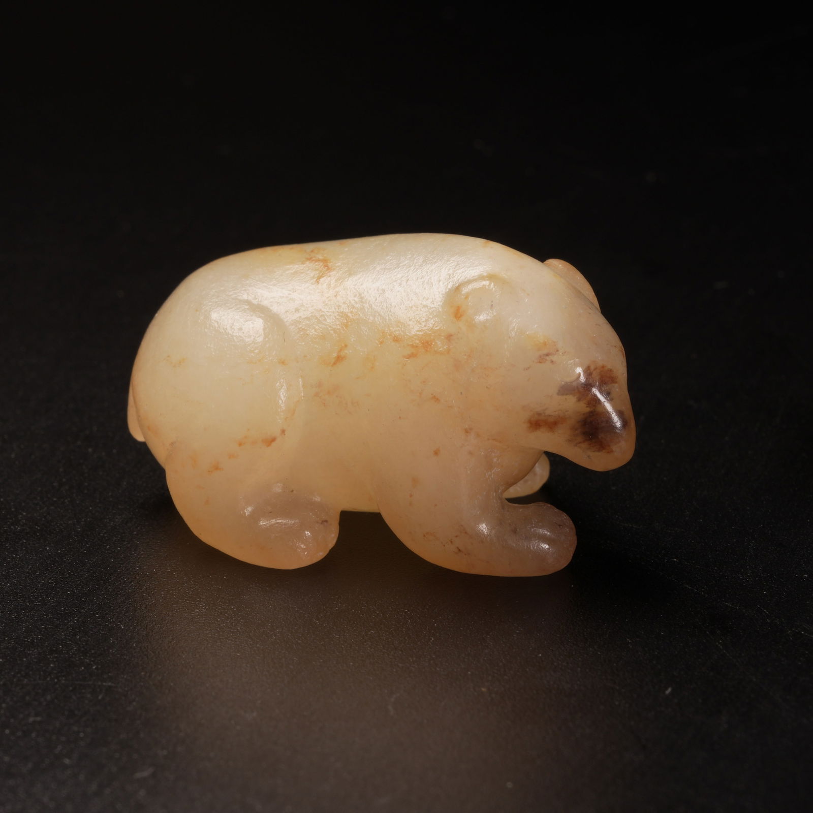 A HETIAN JADE BEAR ORNAMENT: Hetian jade bear ornament