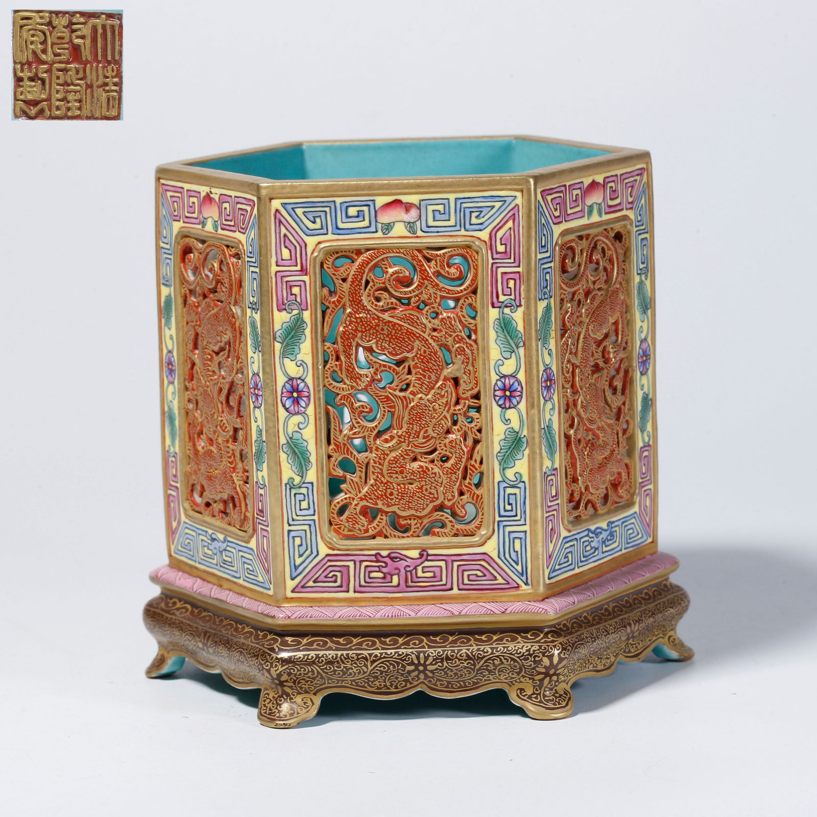 A YELLOW-GROUND FAMILLE-ROSE BRUSH POT WITH CH? DRAGON MOTIF: Yellow-ground famille-rose brush pot with ch? dragon motif