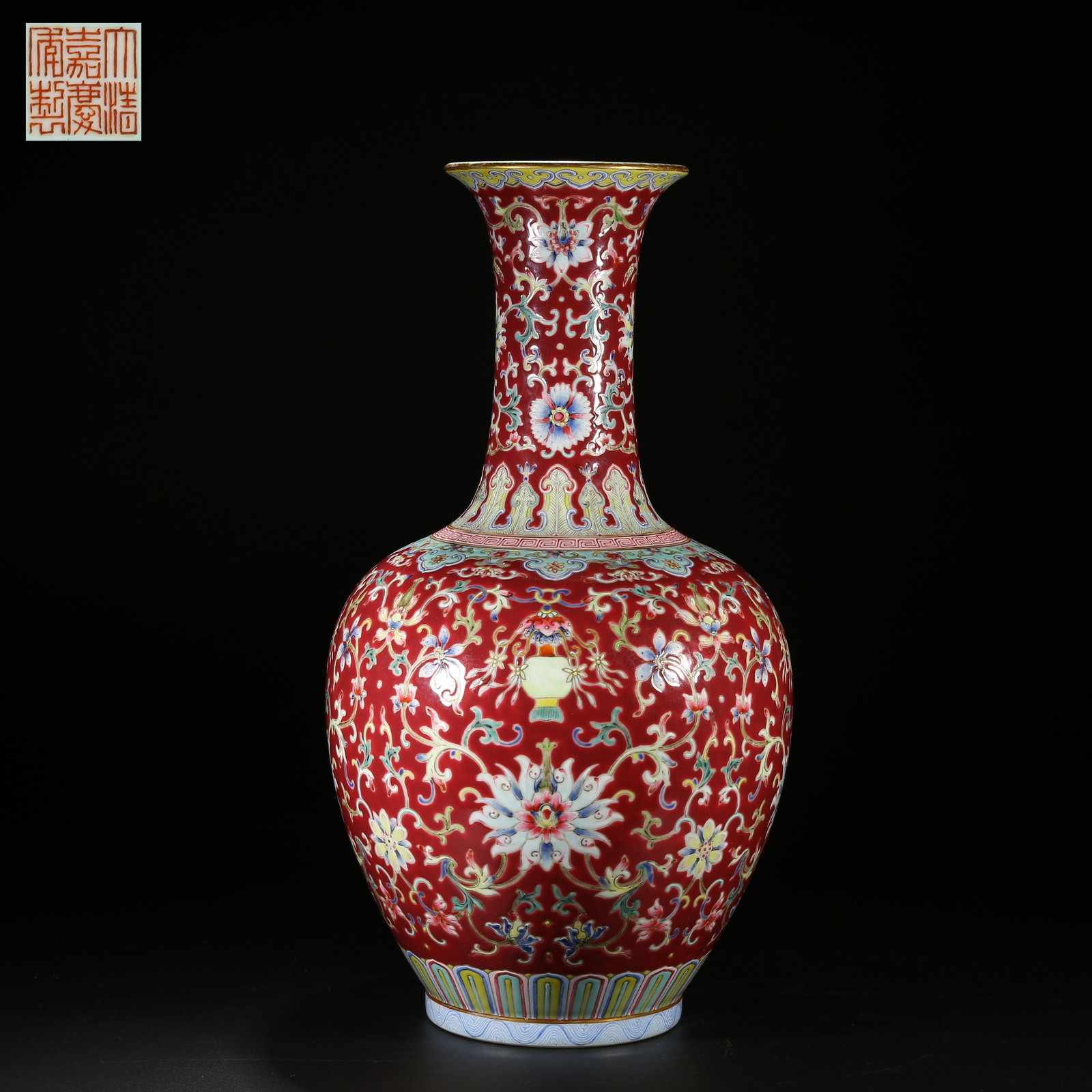 A FAMILLE ROSE FLORAL SCROLL PATTERN VASE WITH CARMINE GROUND AND FLARED MOUTH (1 of 9)