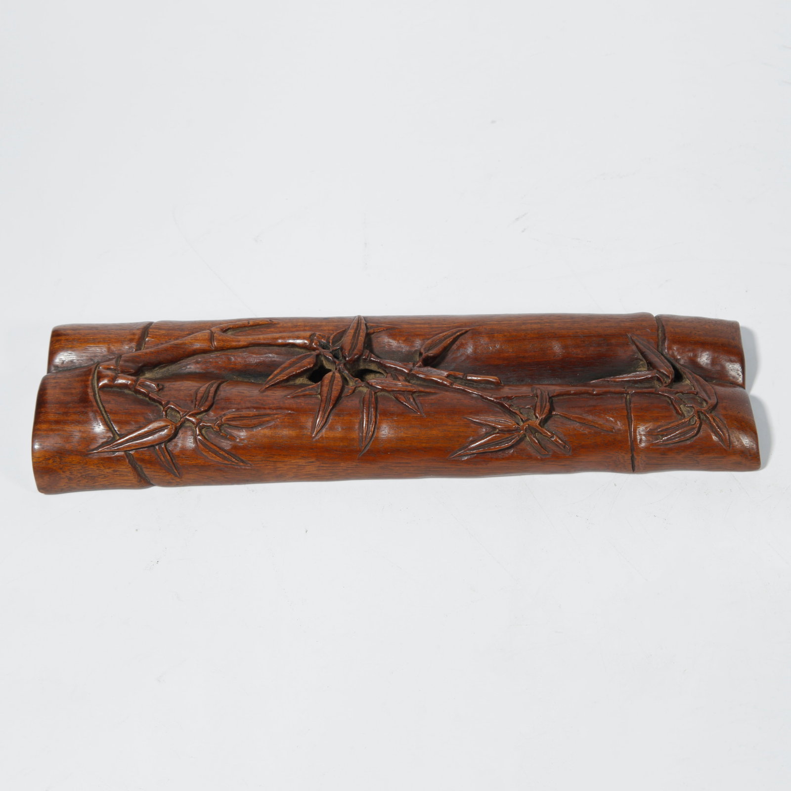 A HUANGHUALI WOOD BAMBOO-SHAPED ARMREST (1 of 9)