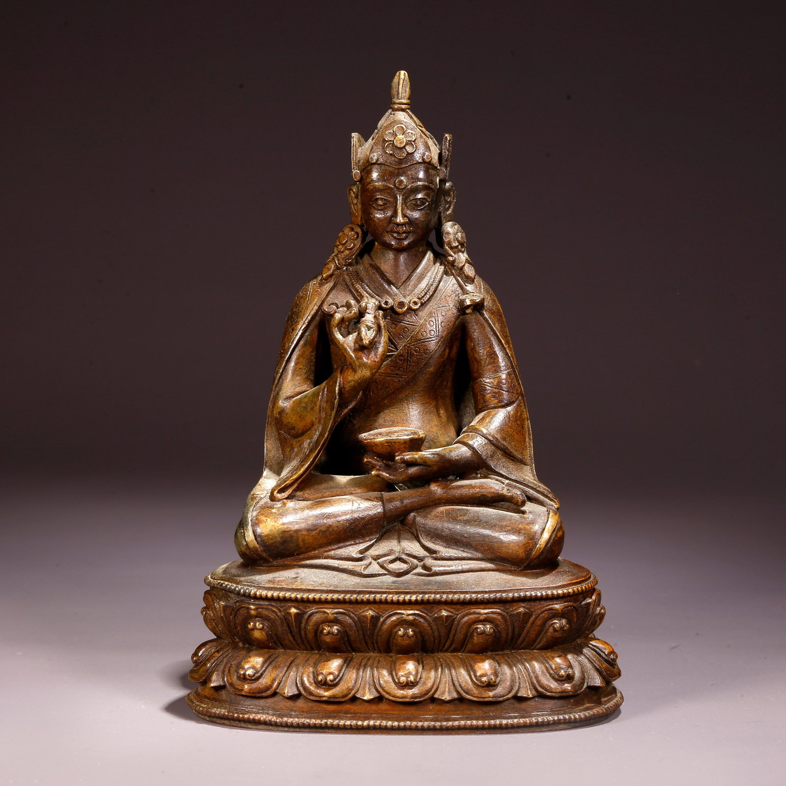 A BRONZE BUDDHA STATUE (1 of 9)