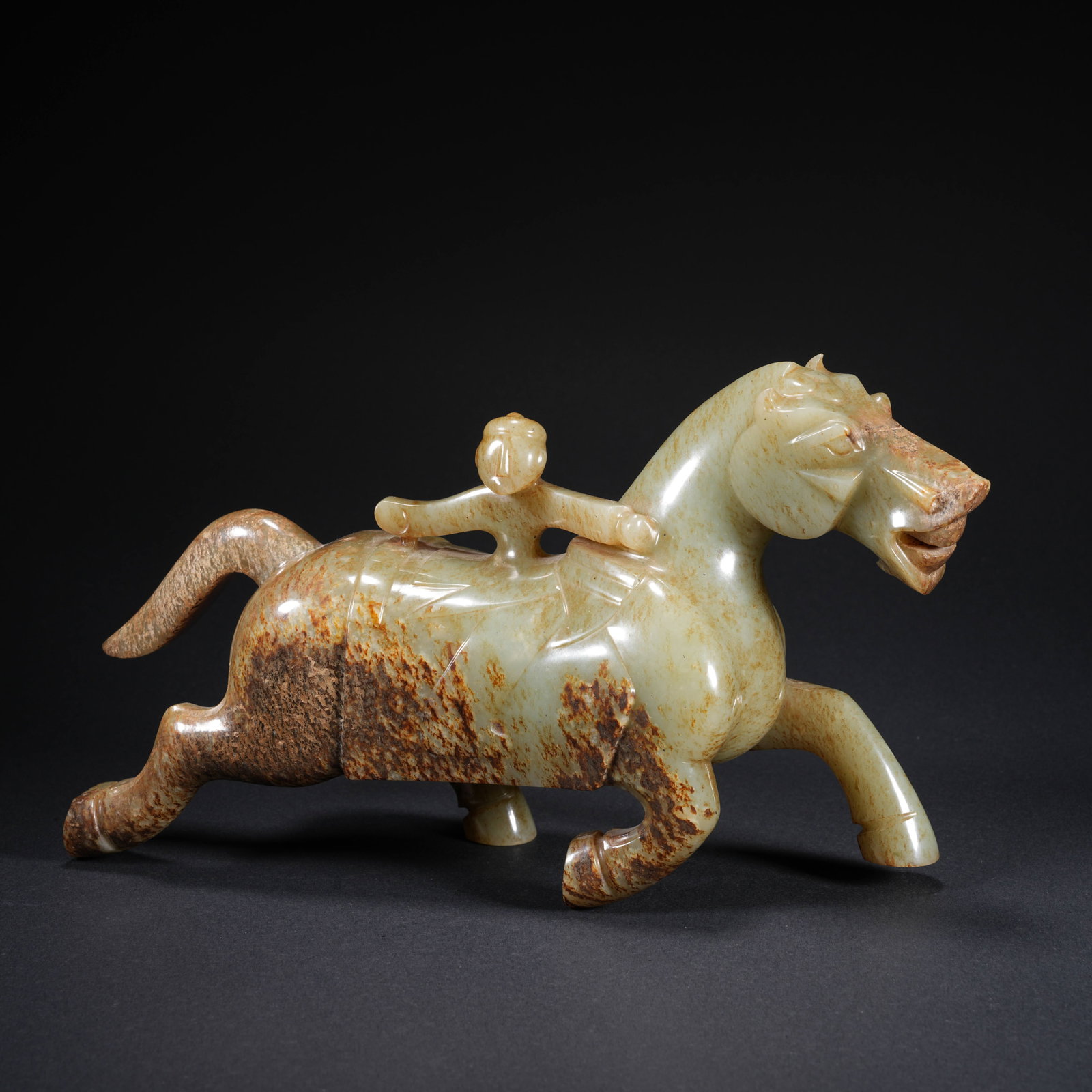 A HETIAN JADE CARVED HORSE-AND-FIGURE FIGURE (1 of 10)