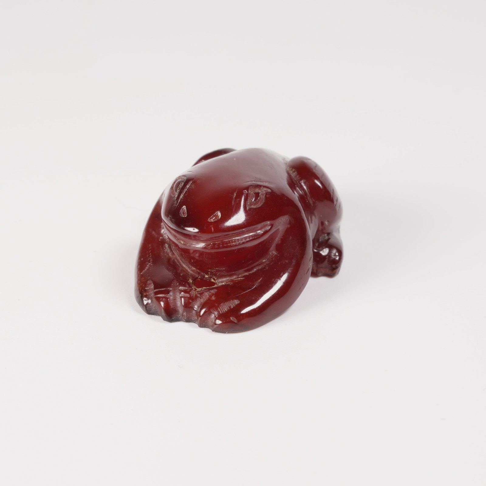 A HONEY-AMBER "GUAGUA LAI CAI" PENDANT (1 of 8)
