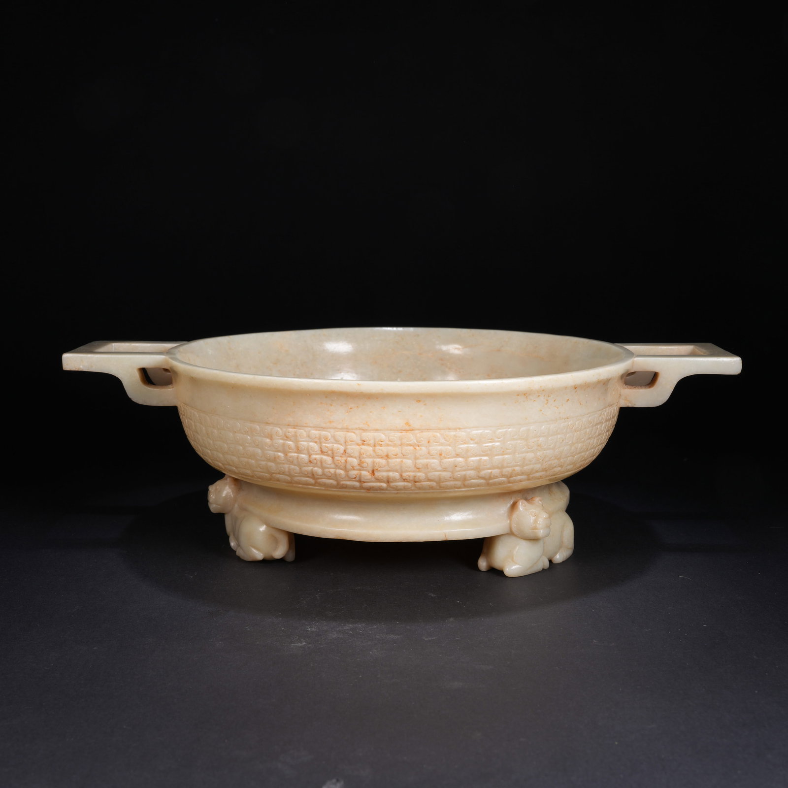 A ANCIENT JADE RITUAL DISH WITH HOOKED CLOUD MOTIF (1 of 10)