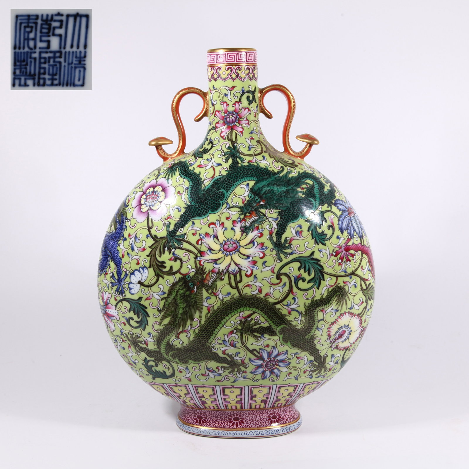 A GREEN GROUND FOREIGN-STYLE DRAGON THROUGH-FLOWER RUYI-HANDLED MOON FLASK (1 of 10)