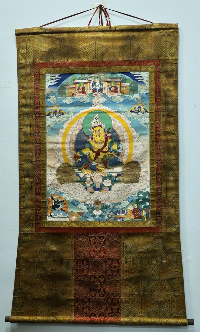A THANGKA OF YELLOW JAMBHALA (WEALTH GOD) (1 of 9)