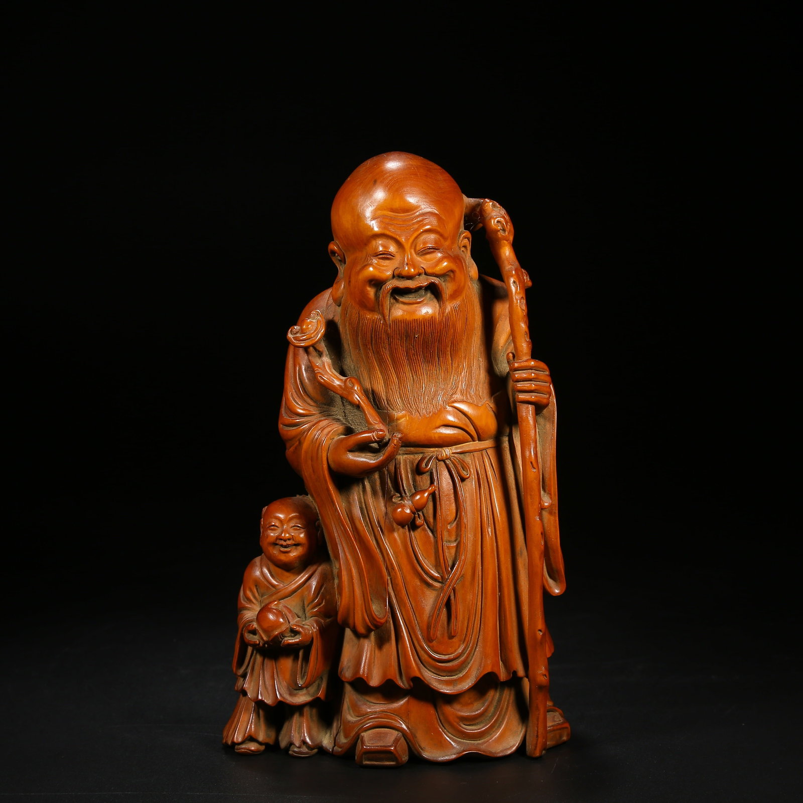 A BOXWOOD SHOUXING FIGURE (1 of 8)