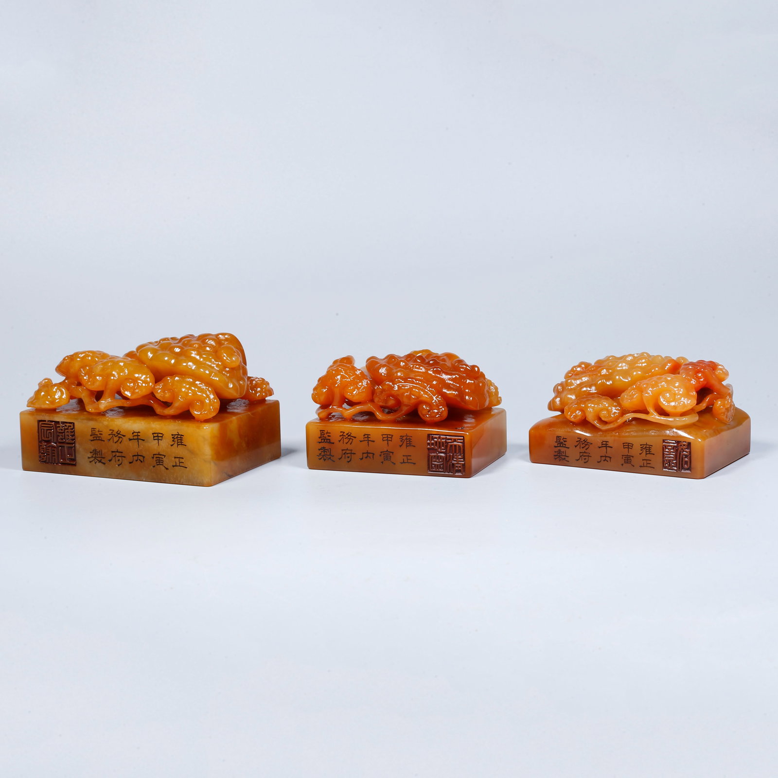 A SET OF SHOUSHAN TIANHUANG STONE CARVED SEALS WITH LINGZHI-FORM FINIALS (1 of 10)