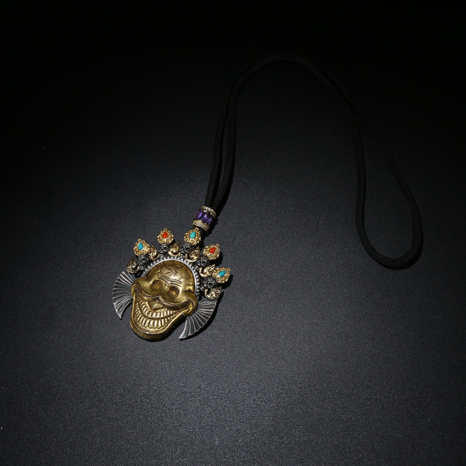 A GILT BRONZE CHARNEL GROUND ORNAMENT WITH 18K GOLD PLATING: Gilt Bronze Charnel Ground Ornament with 18K Gold Plating