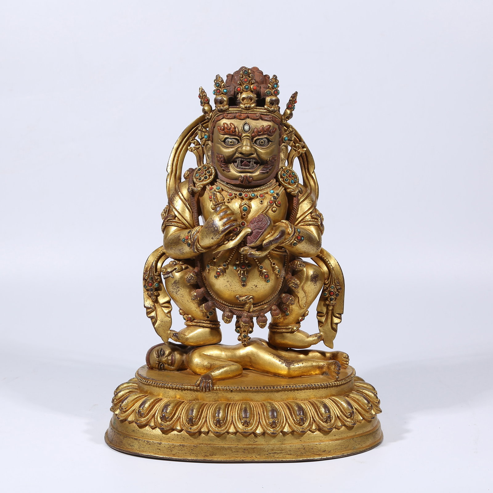 A GILT BRONZE TWO-ARMED MAHAKALA STATUE (1 of 9)