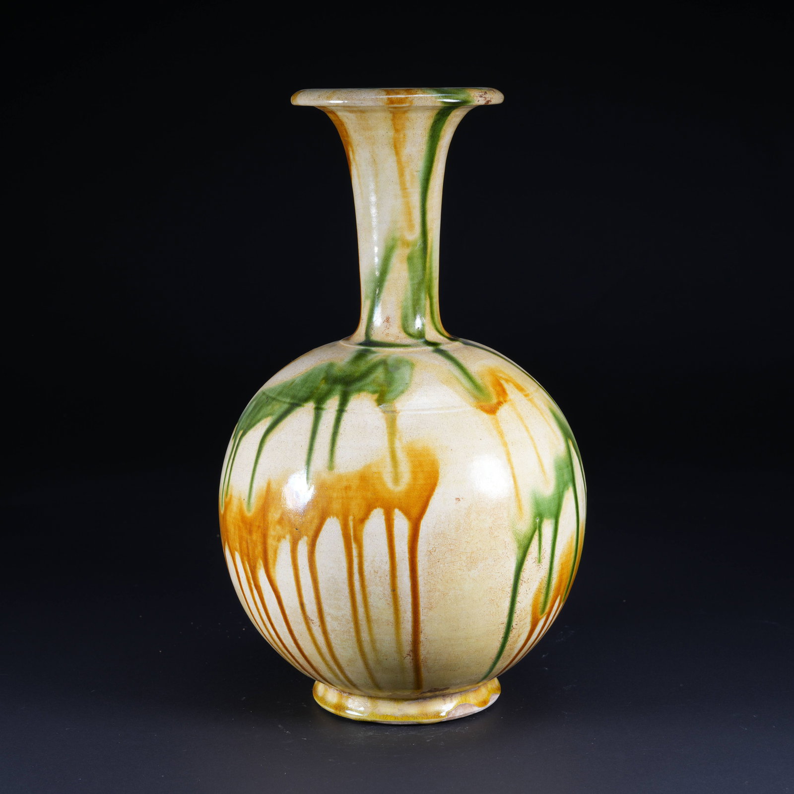 A TANG SANCAI LONG-NECK BOTTLE WITH FLARED MOUTH (1 of 9)
