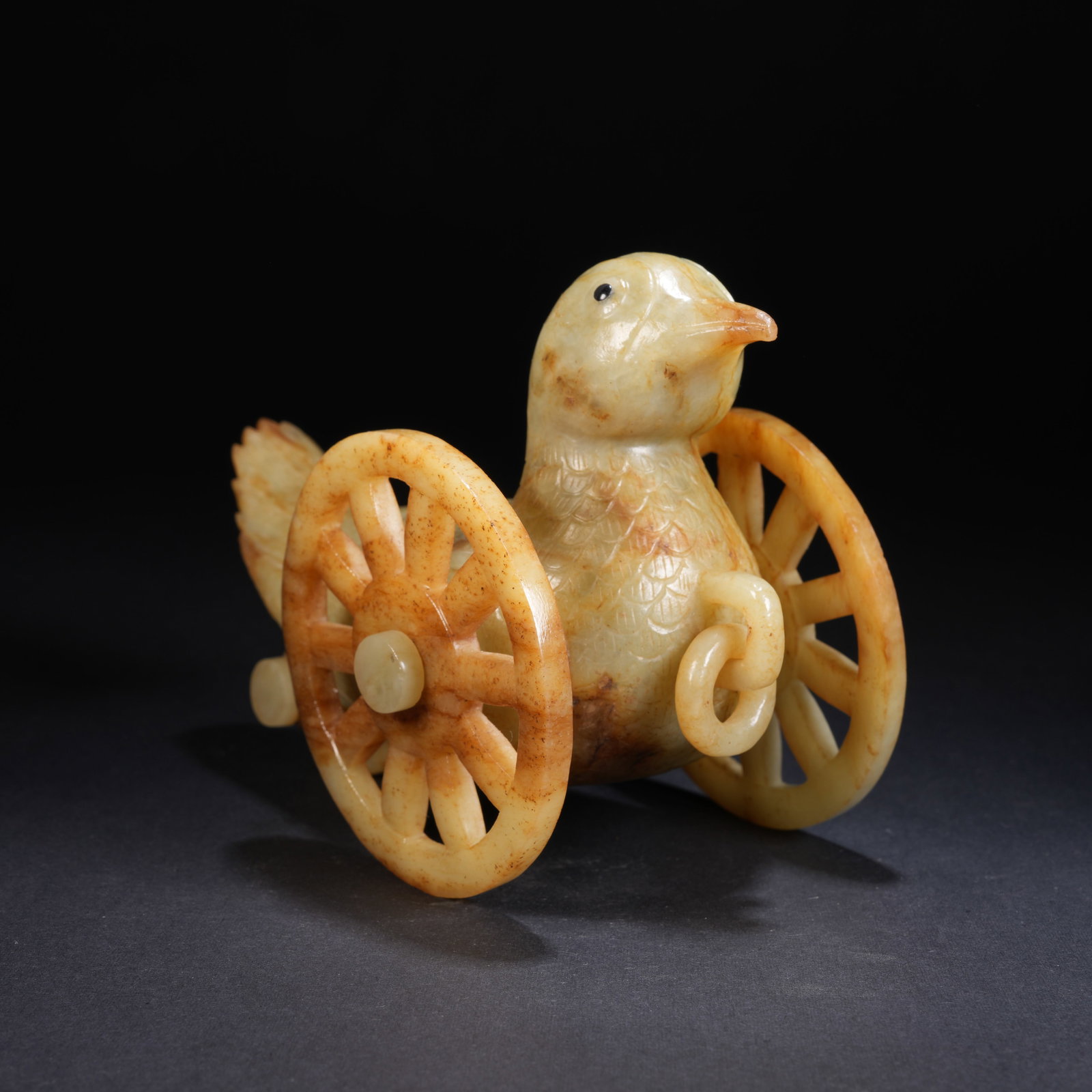 A ANCIENT JADE PHOENIX CHARIOT FIGURINE (1 of 9)