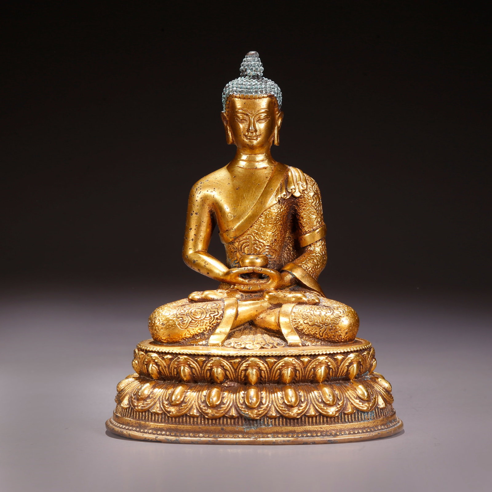 A GILT-BRONZE AMITAYUS (INFINITE-LIFE BUDDHA) FIGURE (1 of 9)