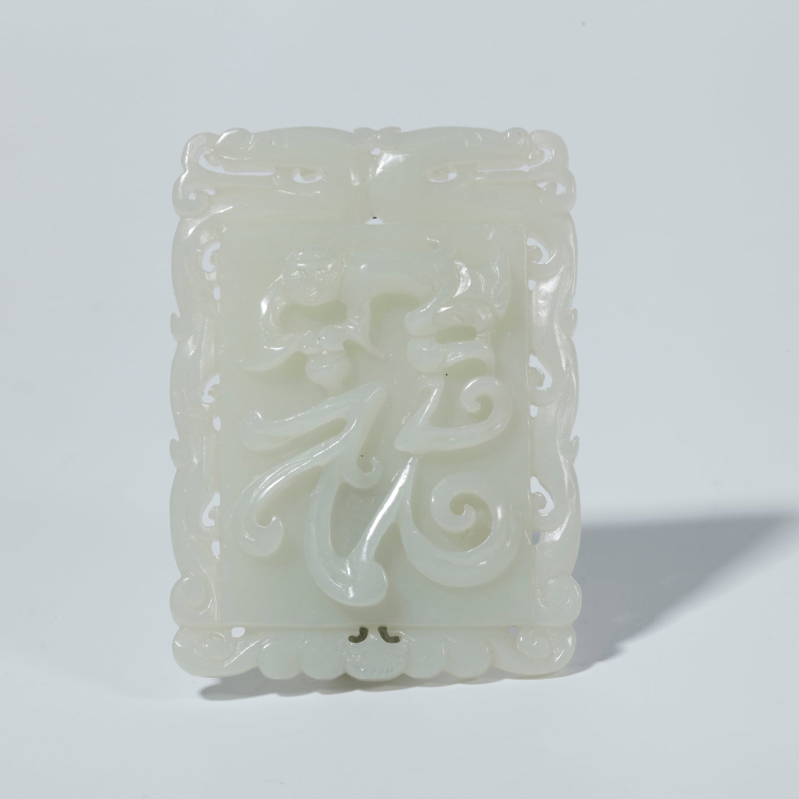 A HETIAN JADE PLAQUE WITH CHILD MOTIF (1 of 10)