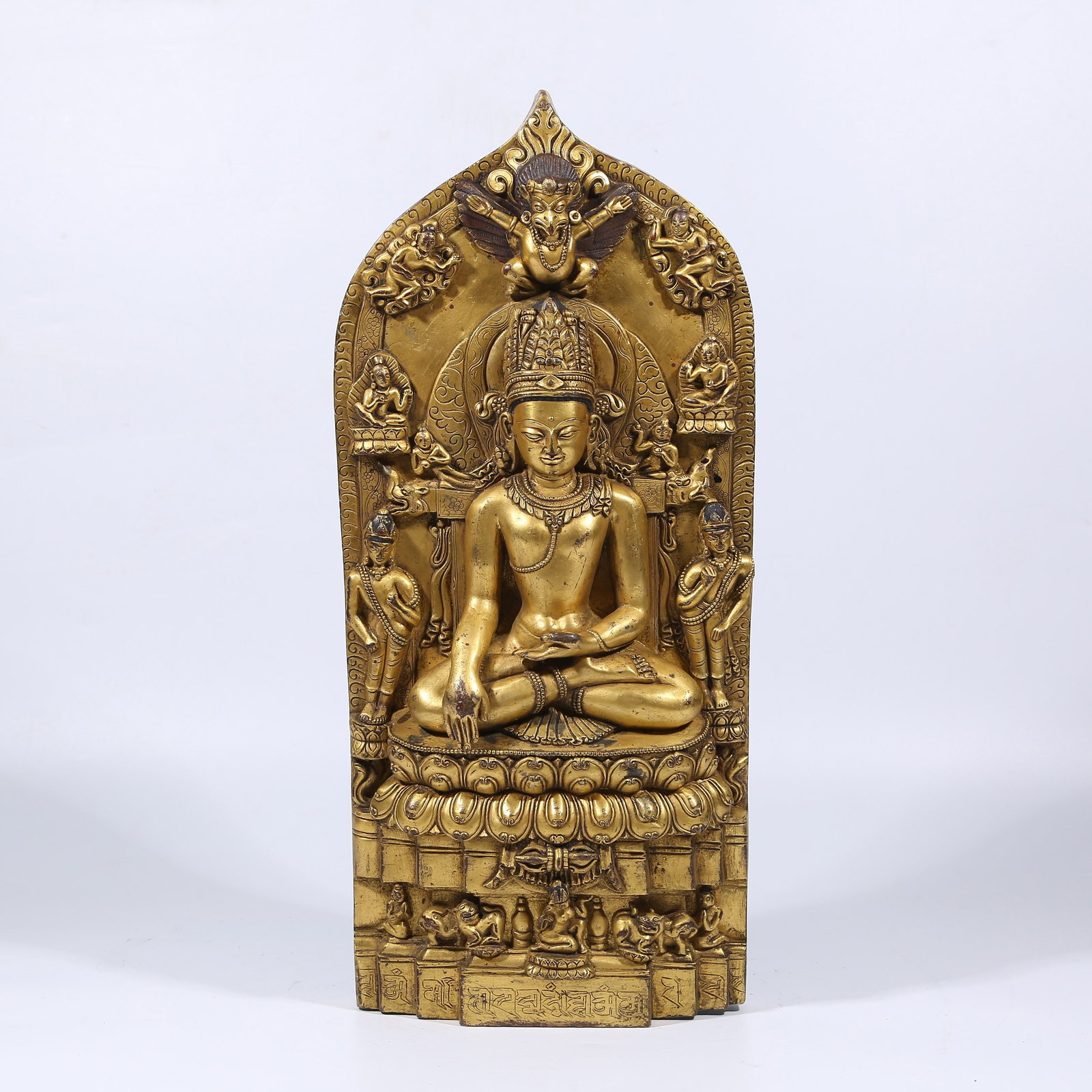 A GILT BRONZE CROWNED SHAKYAMUNI STATUE (1 of 9)