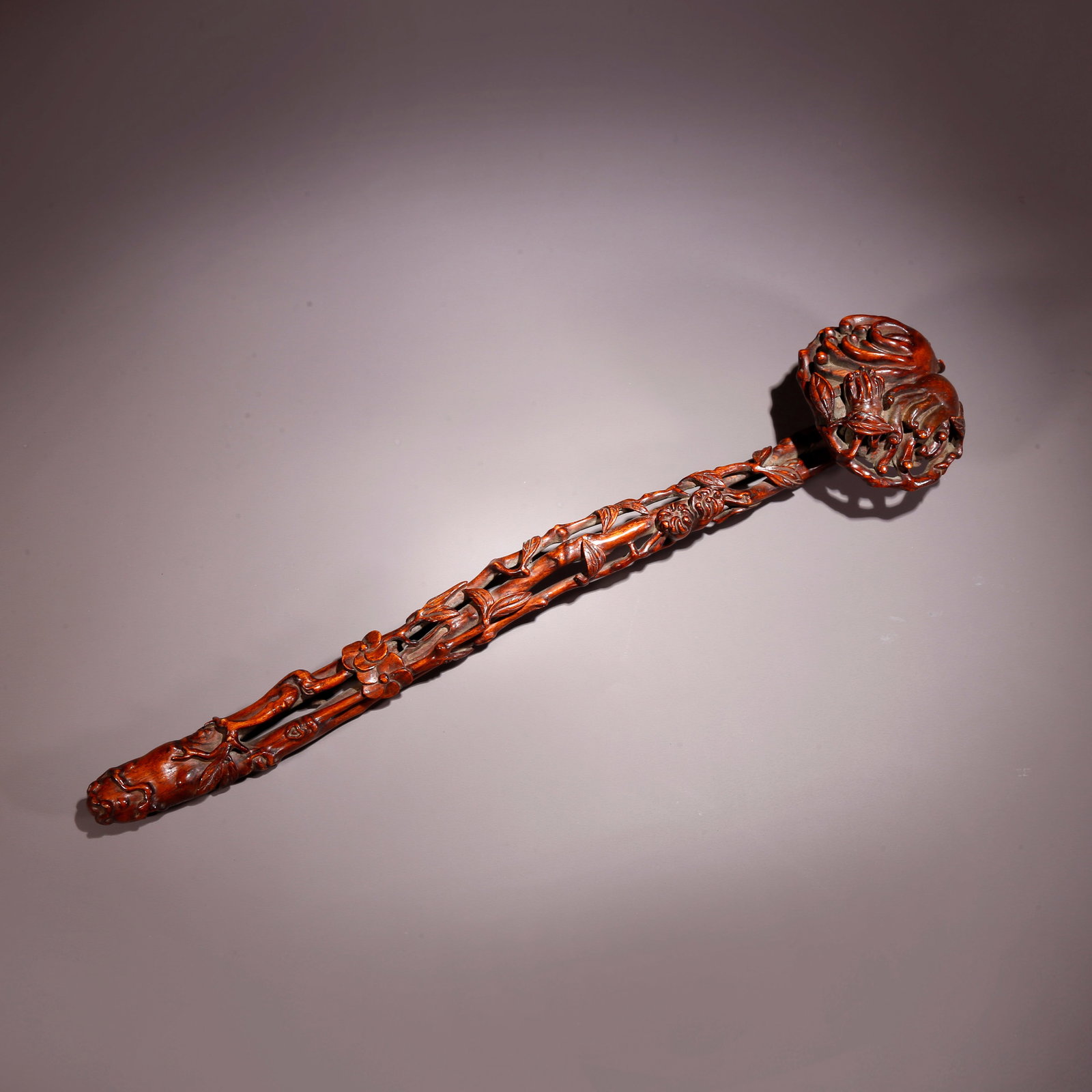 A HUANGHUALI WOOD CARVED BUDDHA'S HAND PATTERN RUYI SCEPTER (1 of 10)
