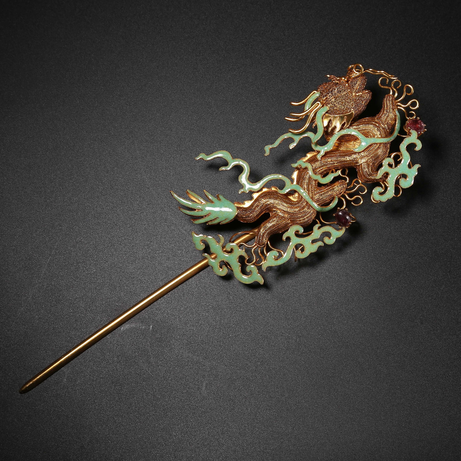 A SILVER GILT, FIRE-BLUE HAIRPIN WITH CLOUD AND DRAGON MOTIF (1 of 9)