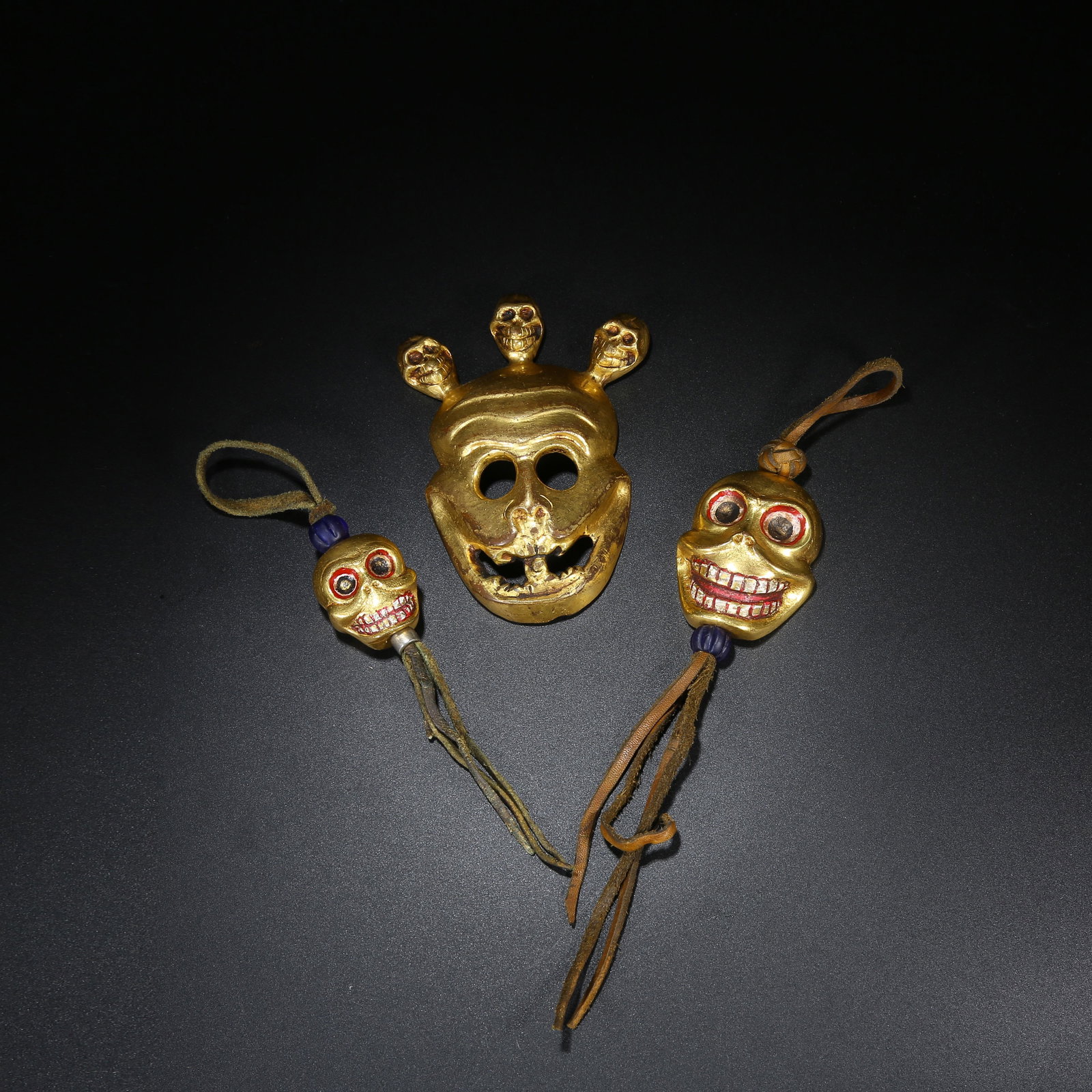 A SET OF GILT BRONZE CHARNEL GROUND ORNAMENTS: Set of Gilt Bronze Charnel Ground Ornaments