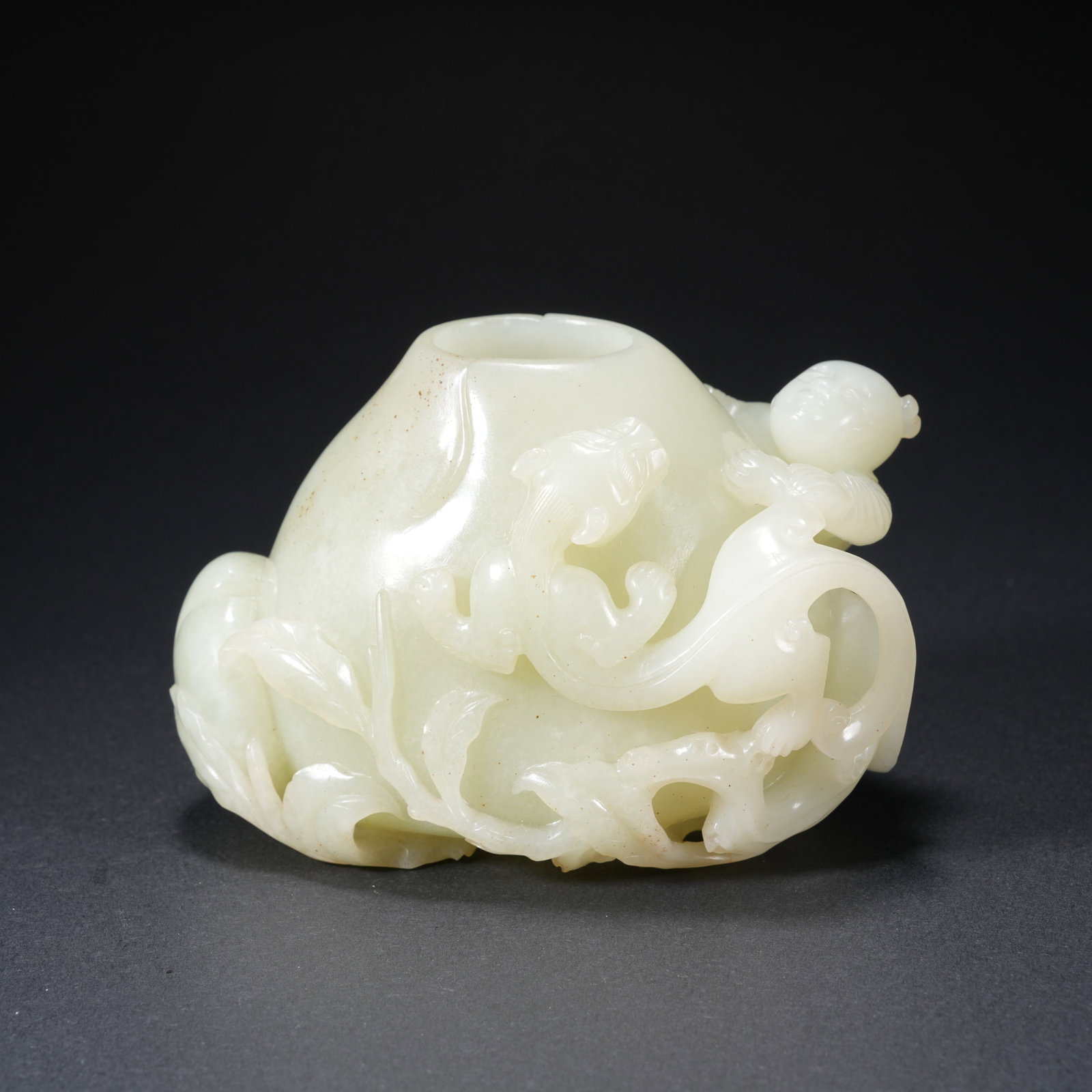 A HETIAN JADE WATER POT WITH BOY MOTIF (1 of 10)