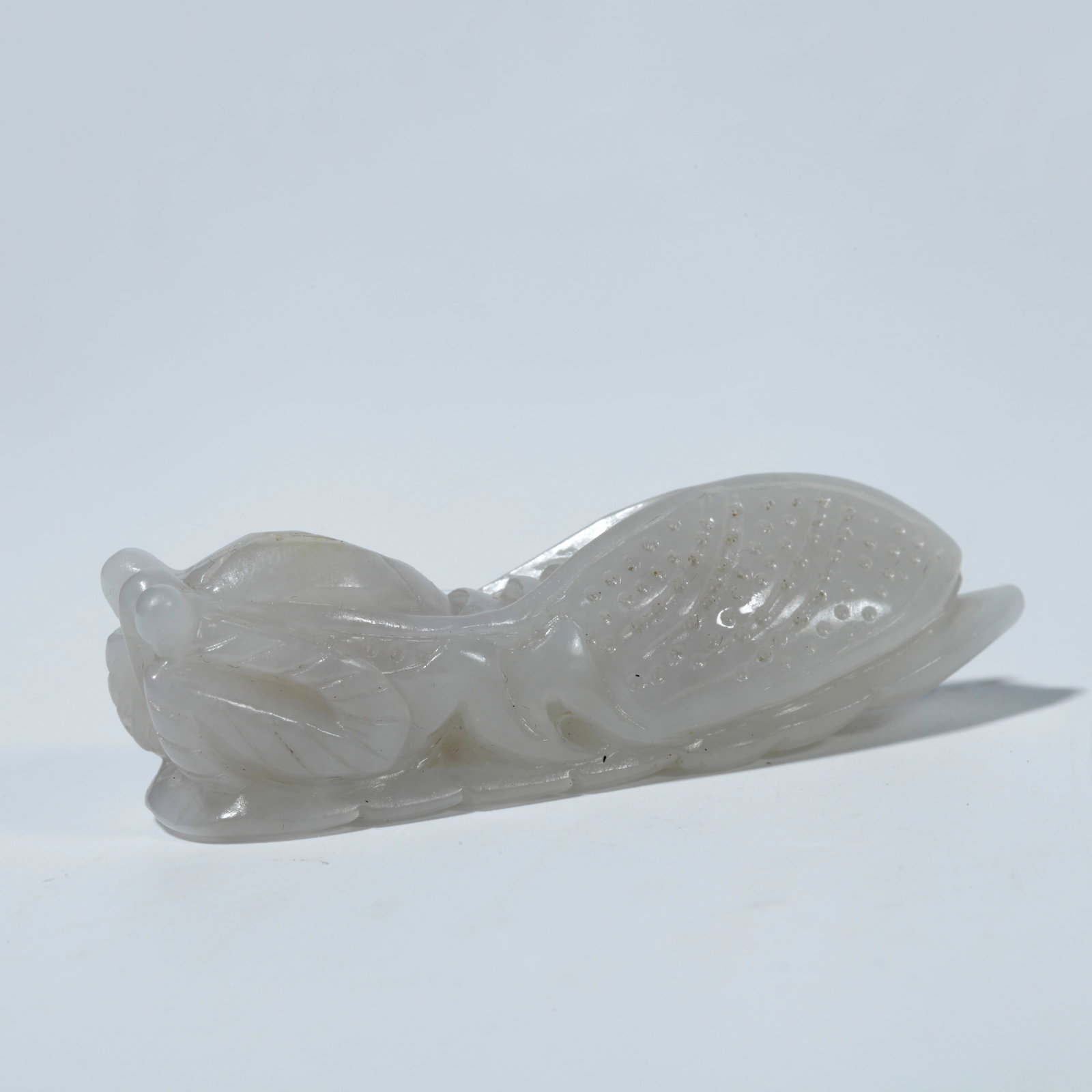 A HETIAN JADE FIGURINE "ASTONISHING AT FIRST SOUND" (1 of 8)