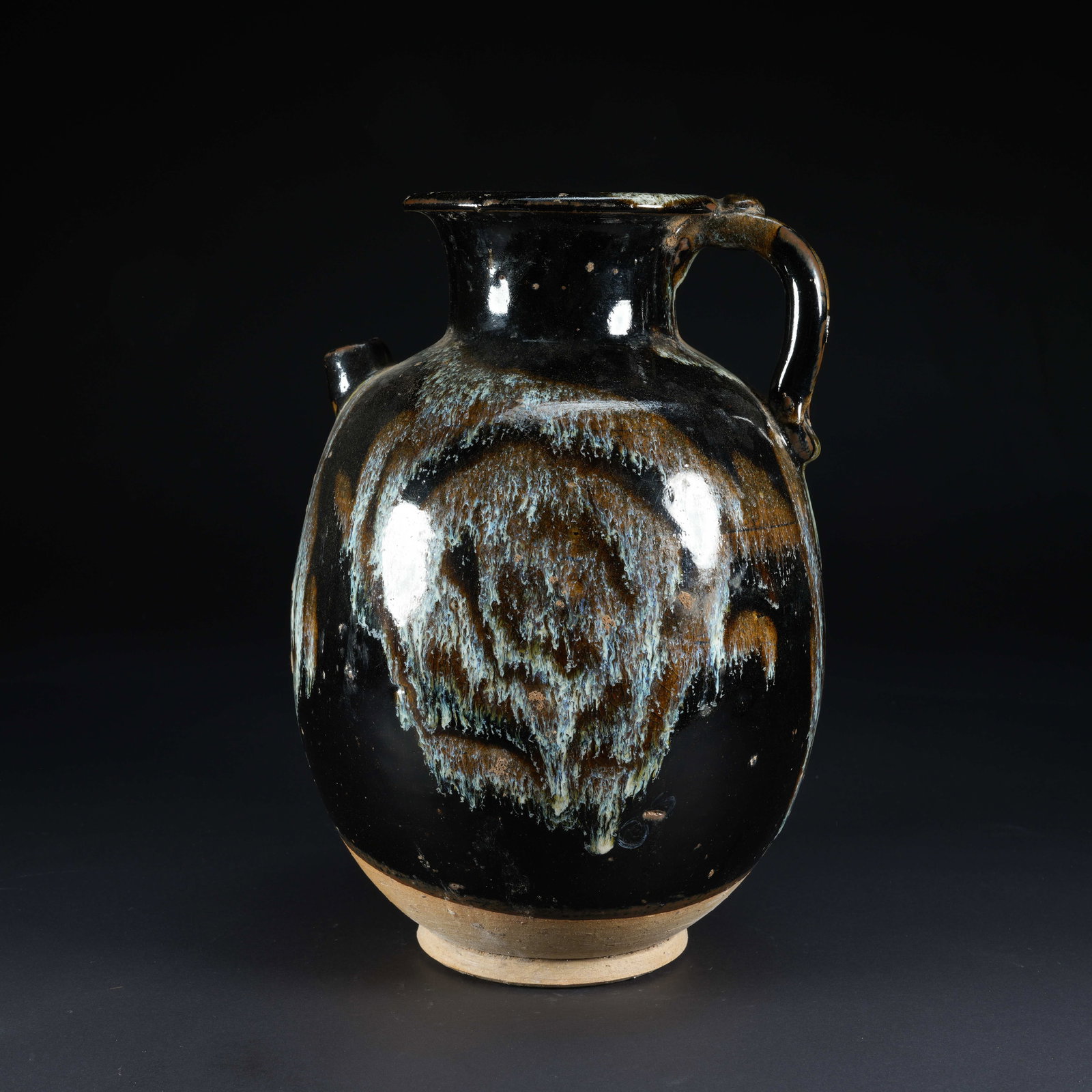 A BLACK-GLAZED FLOWER-GLAZED EWER (1 of 9)