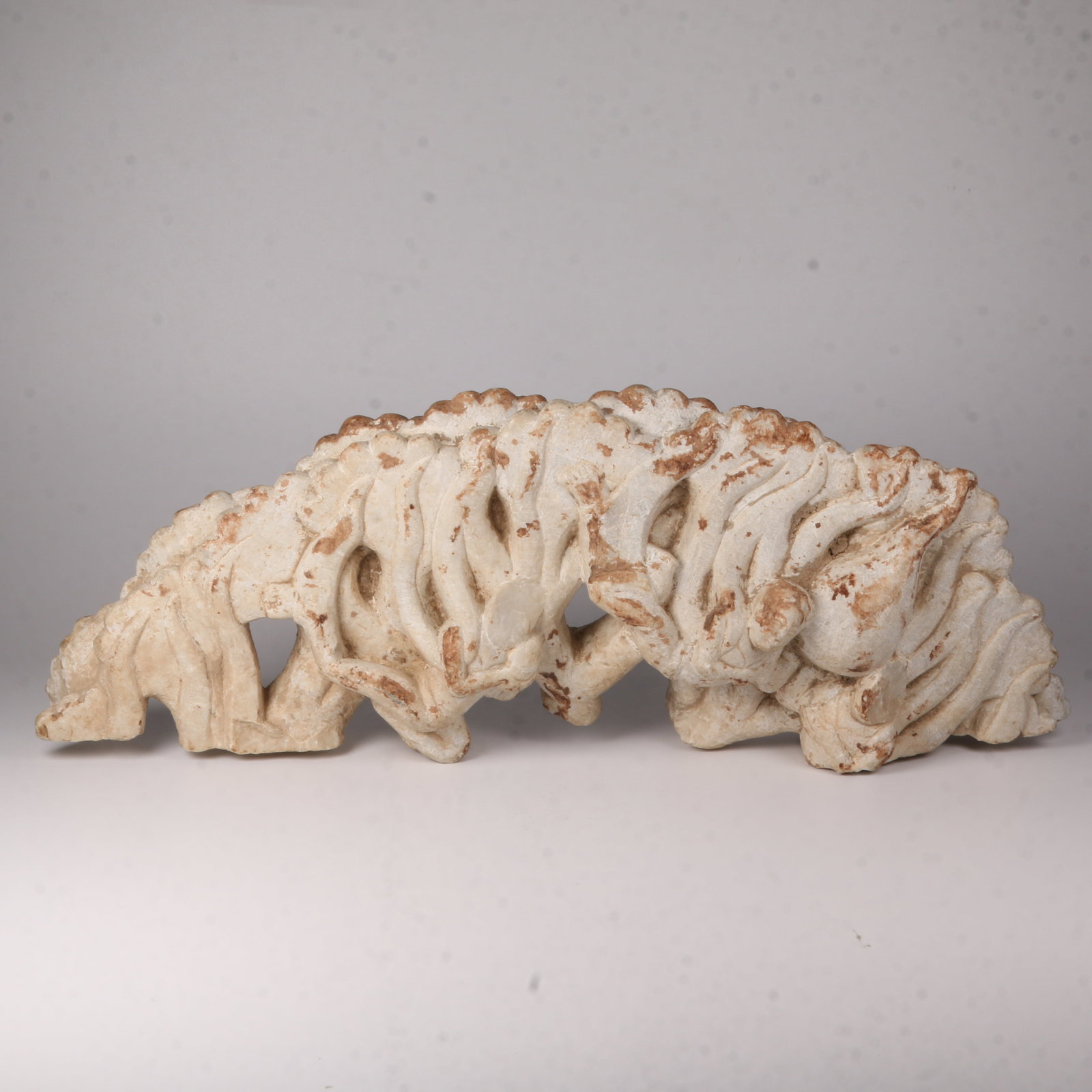 A STONE FLYING APSARA ORNAMENT (1 of 11)