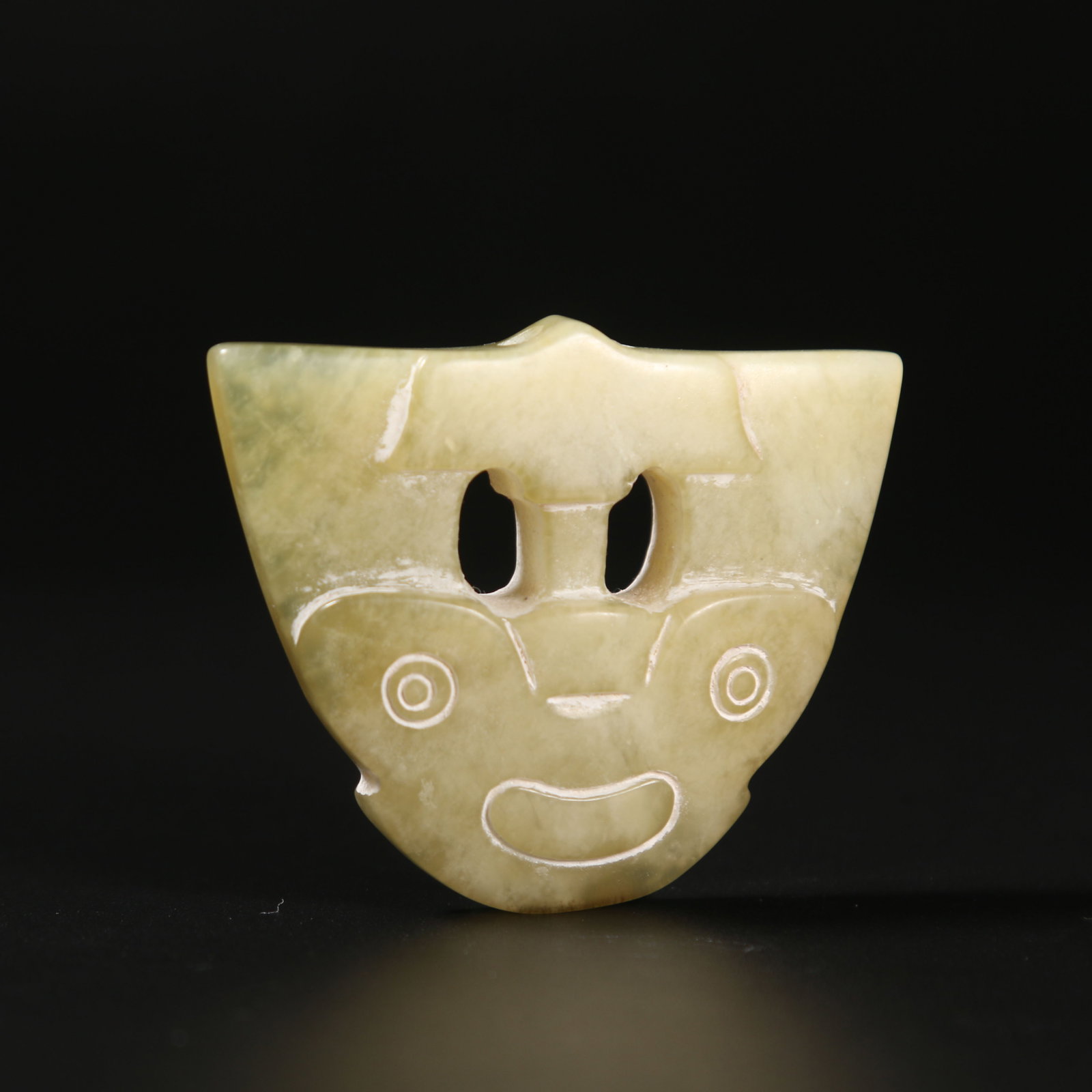 A ARCHAIC JADE MASK ORNAMENT (1 of 7)