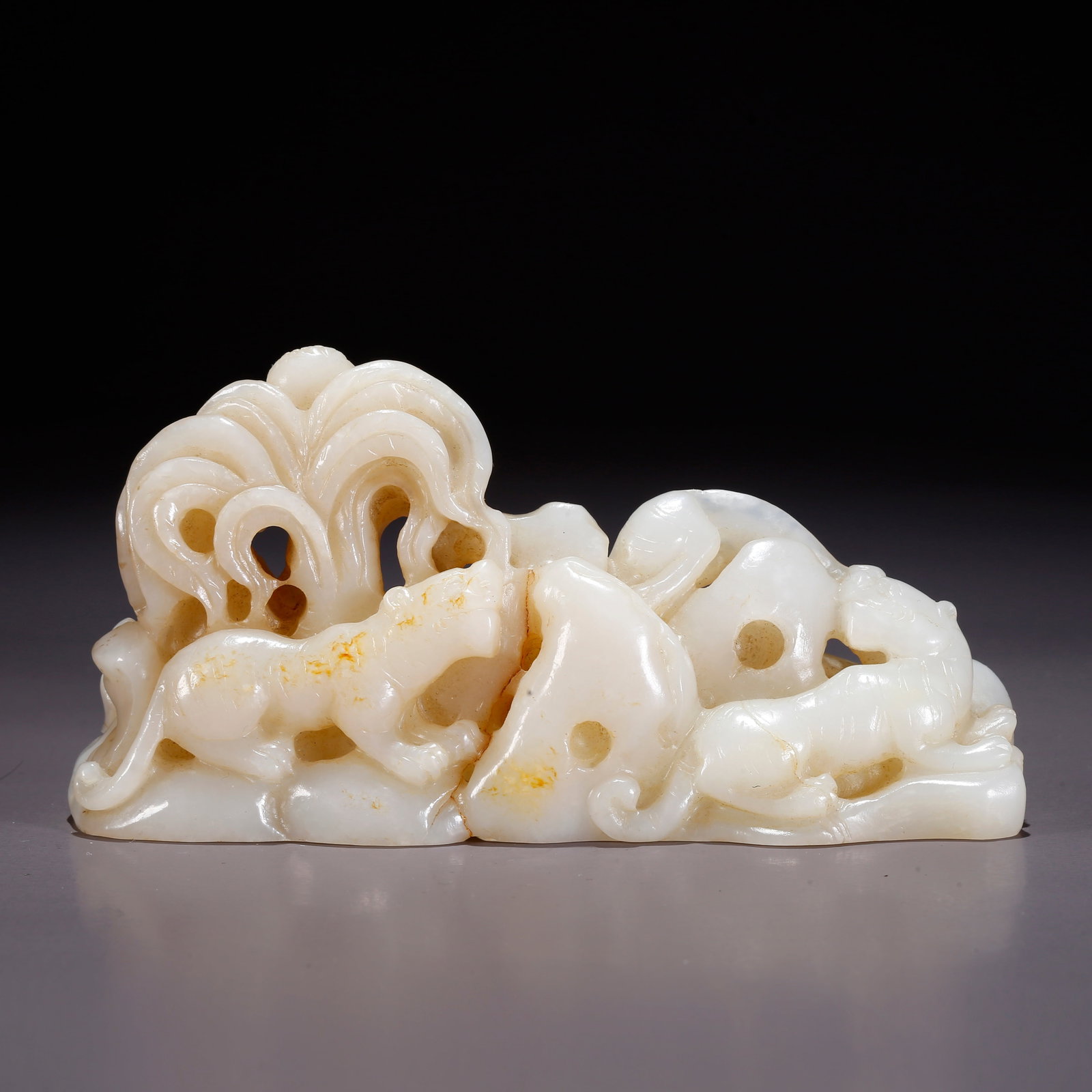 A HETIAN JADE MOUNTAIN AND AUSPICIOUS BEAST FIGURINE (1 of 9)