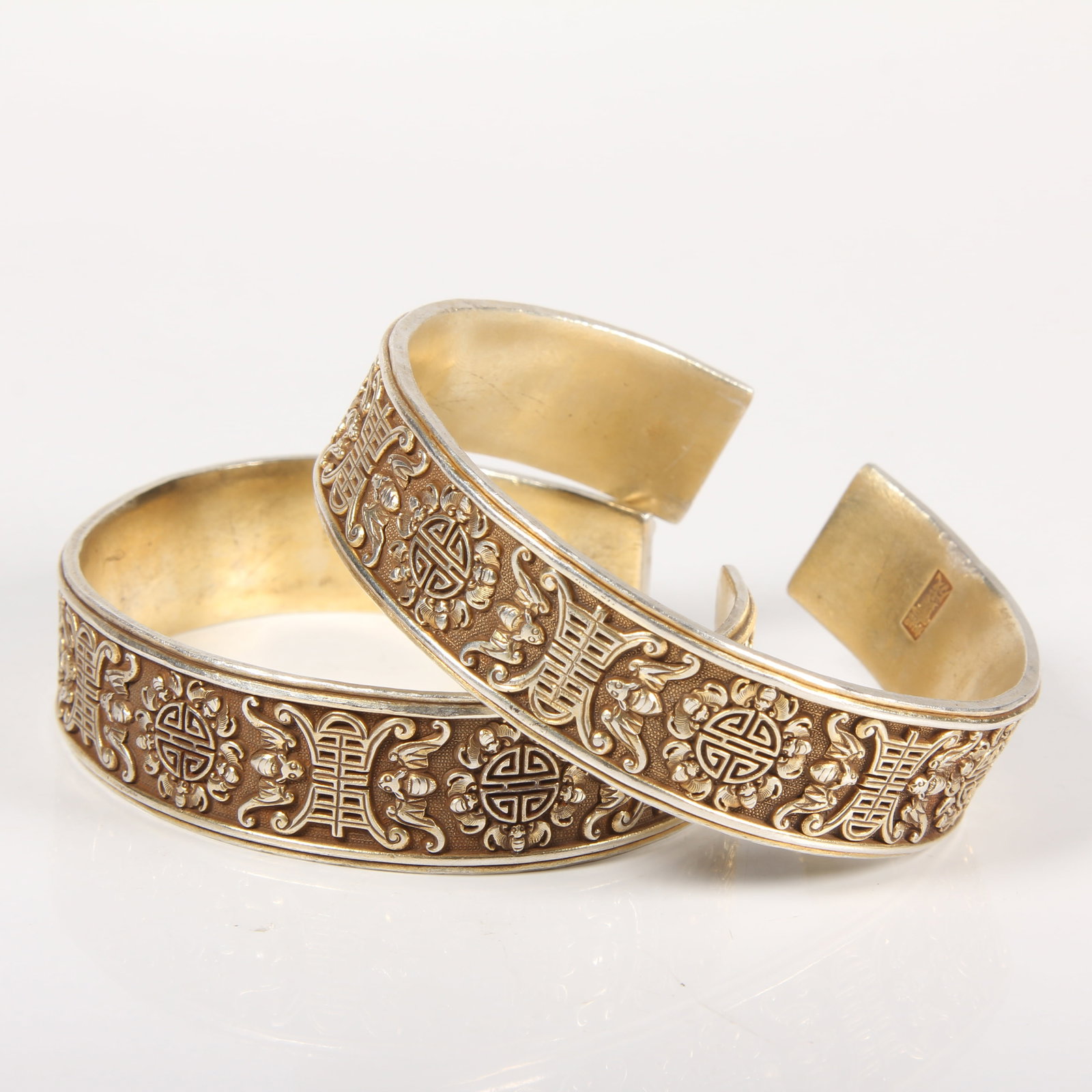 A PAIR OF SILVER BRACELETS WITH LONGEVITY AND HAPPINESS MOTIF (1 of 11)