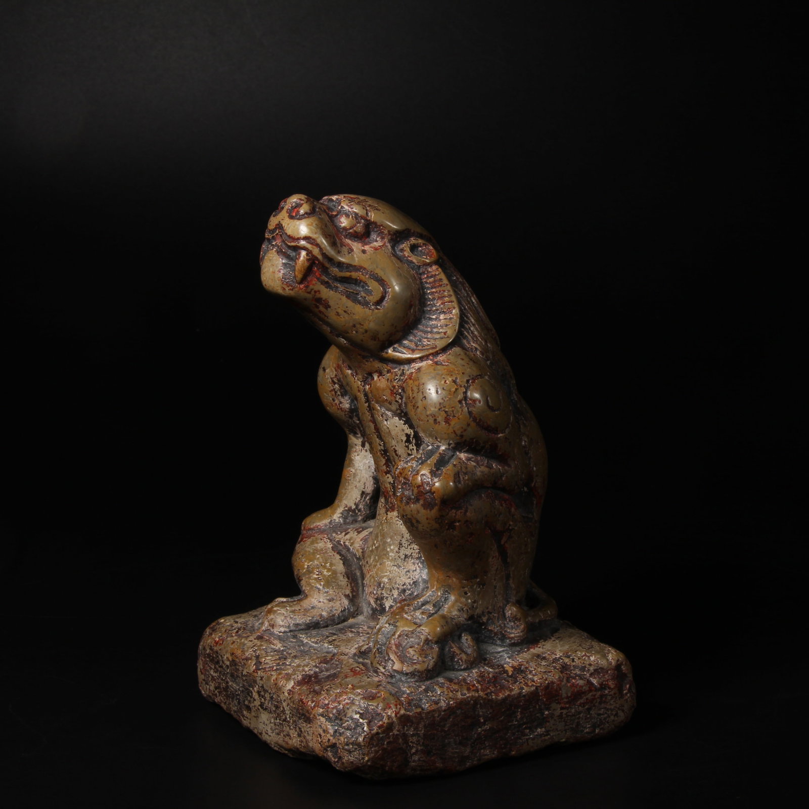 A WUHUA STONE PAPERWEIGHT WITH BEAST-FORM KNOB: Wuhua Stone Paperweight with Beast-Form Knob