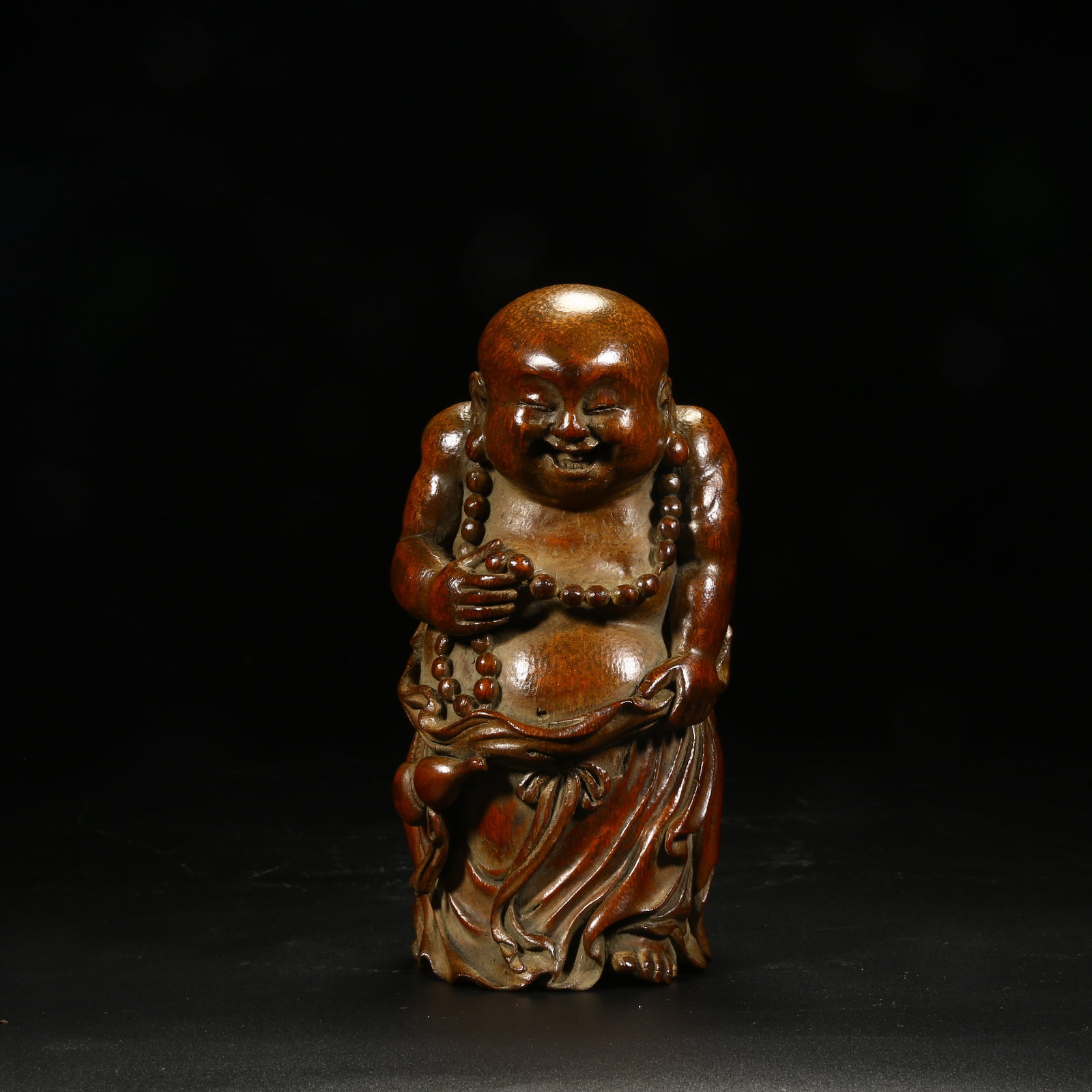 A BAMBOO ROOT CARVED MAITREYA BUDDHA (1 of 8)