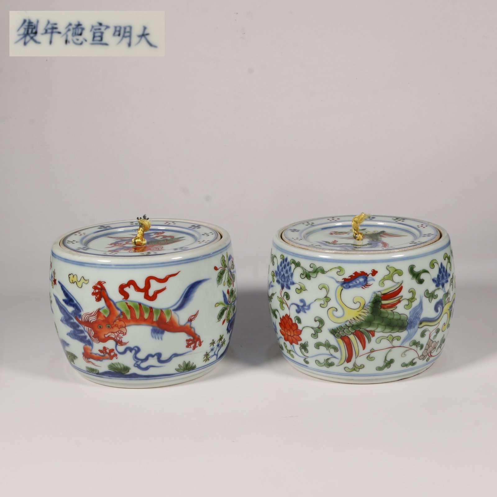 A FAMILLE VERTE SET OF CRICKET JARS WITH DRAGON AND PHOENIX MOTIFS (1 of 10)