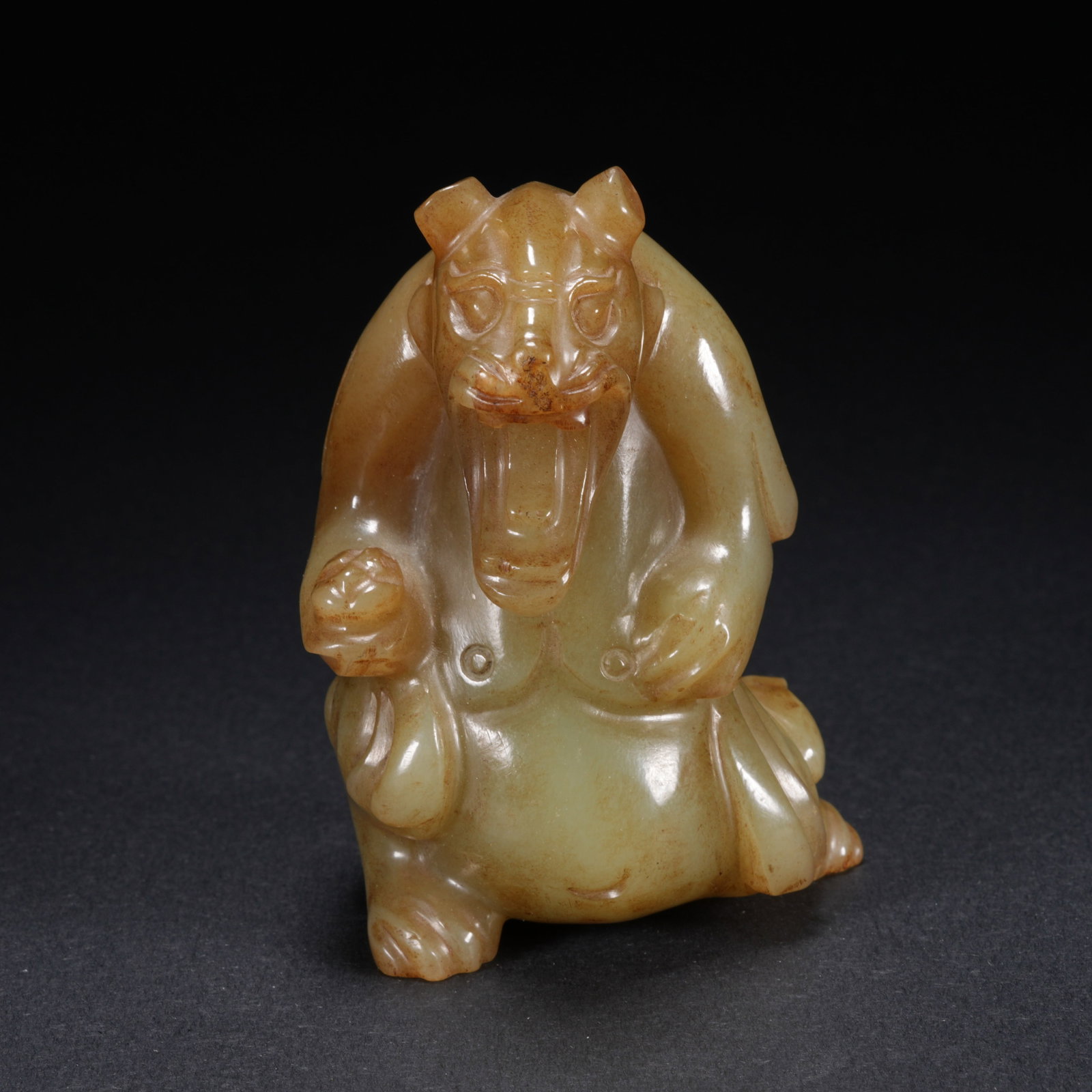 A HETIAN JADE CARVED BEAR FIGURE (1 of 10)