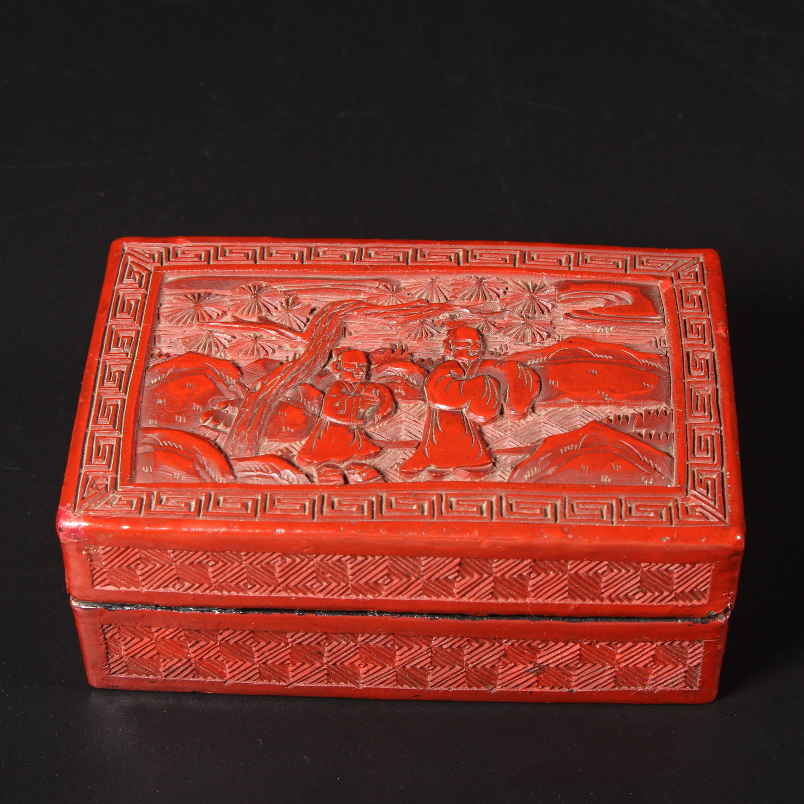A CARVED RED LACQUER BOX WITH SCHOLAR BENEATH PINES (1 of 8)