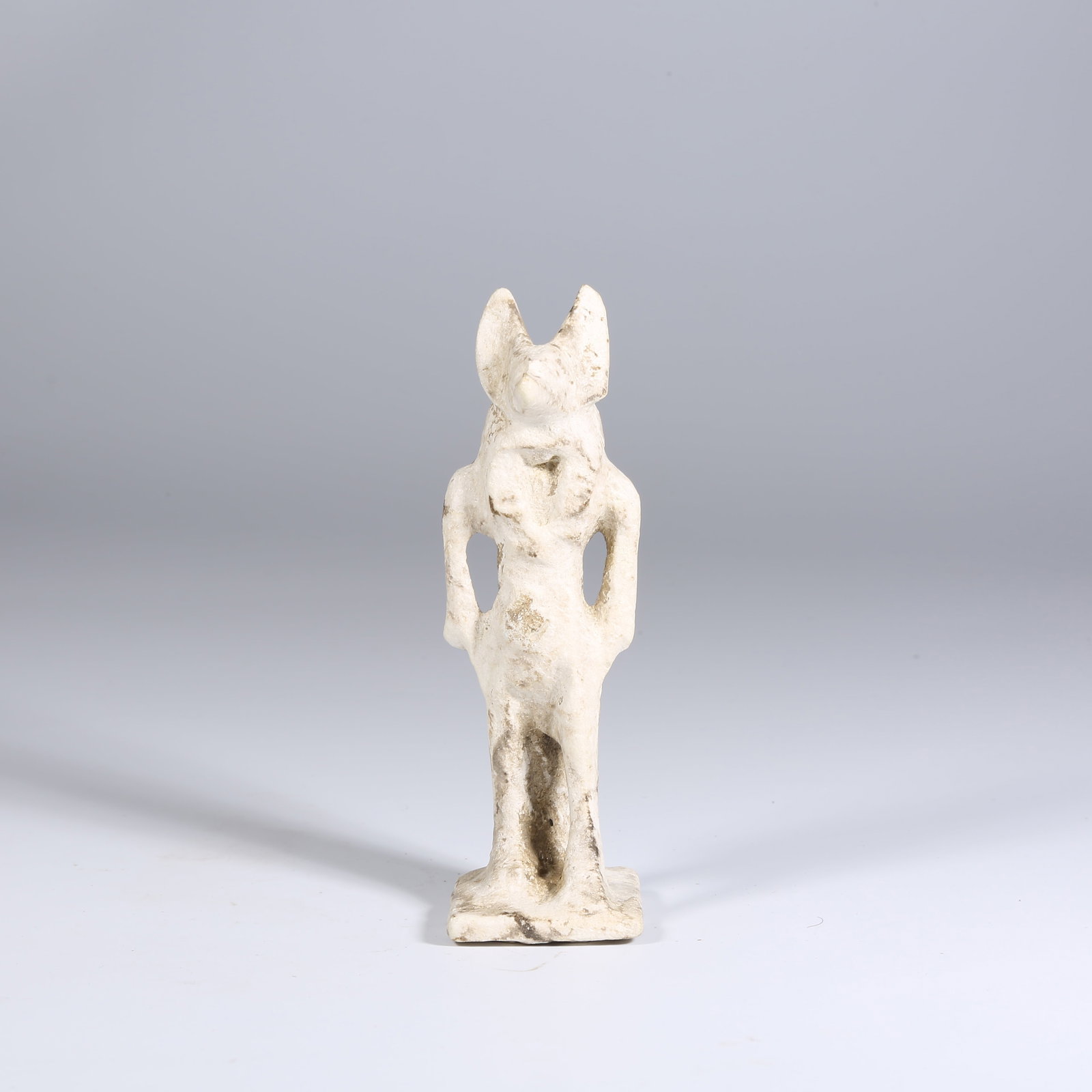 A STONE EGYPTIAN FIGURE (1 of 9)