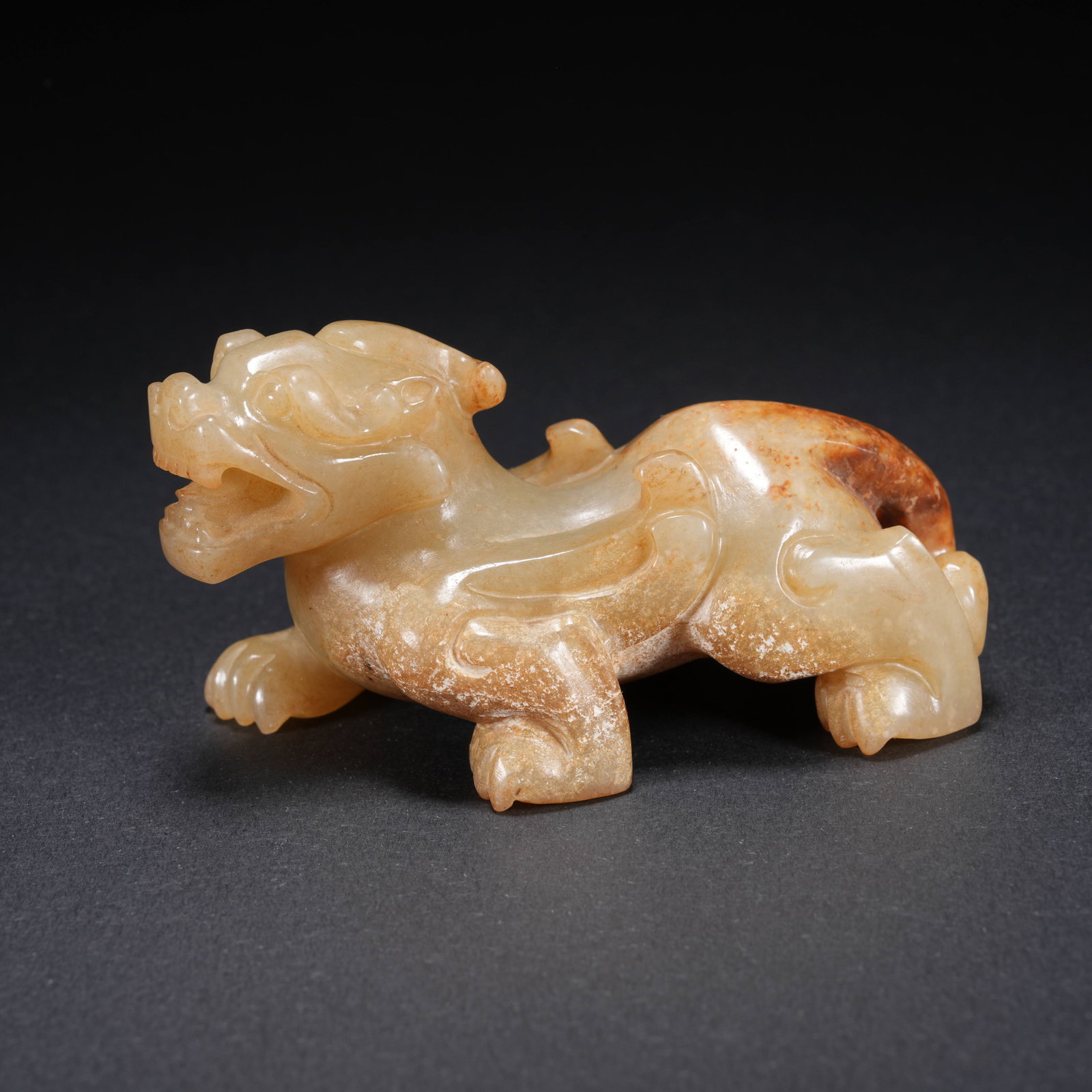 A HETIAN JADE CARVED CHI-TIGER FIGURE (1 of 10)
