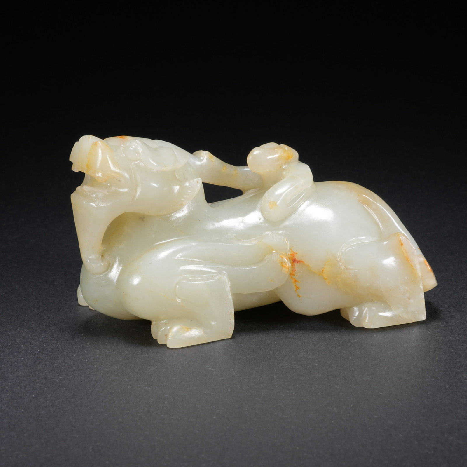 A HETIAN JADE CARVED ANIMAL-FORM FIGURE (1 of 10)