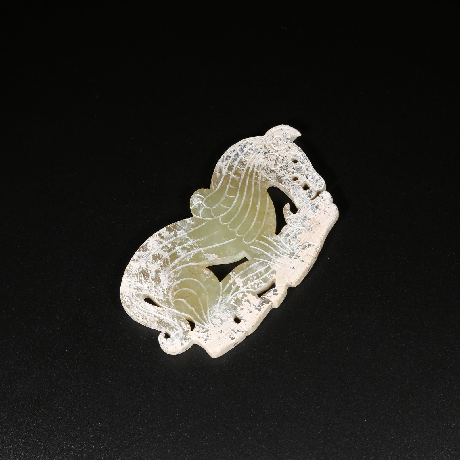 A ANCIENT JADE AUSPICIOUS BEAST PENDANT (1 of 8)