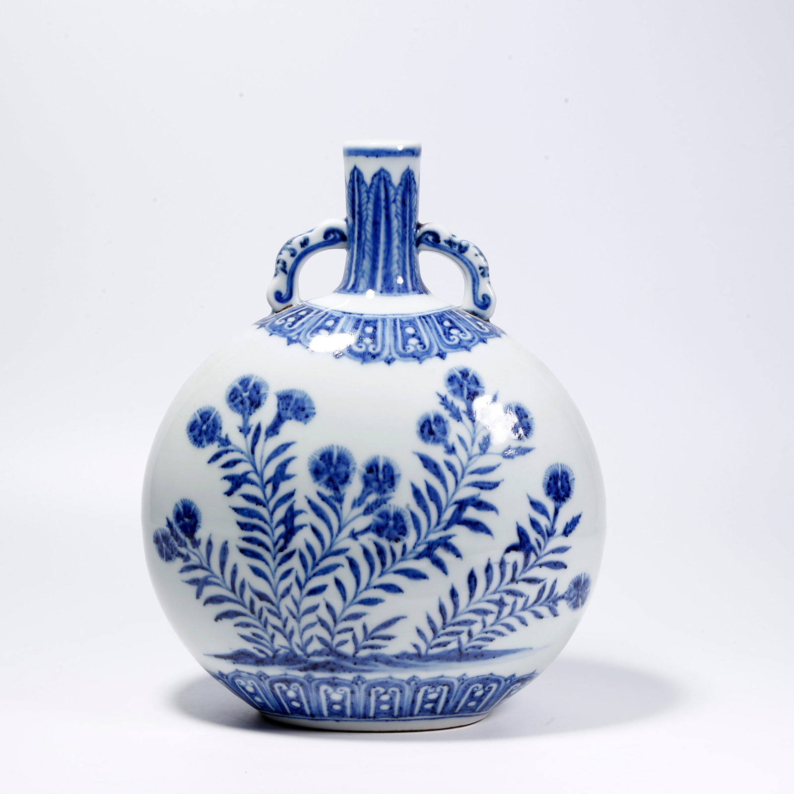A BLUE-AND-WHITE MOONFLASK WITH FLOWER AND PLANT PATTERN (1 of 10)