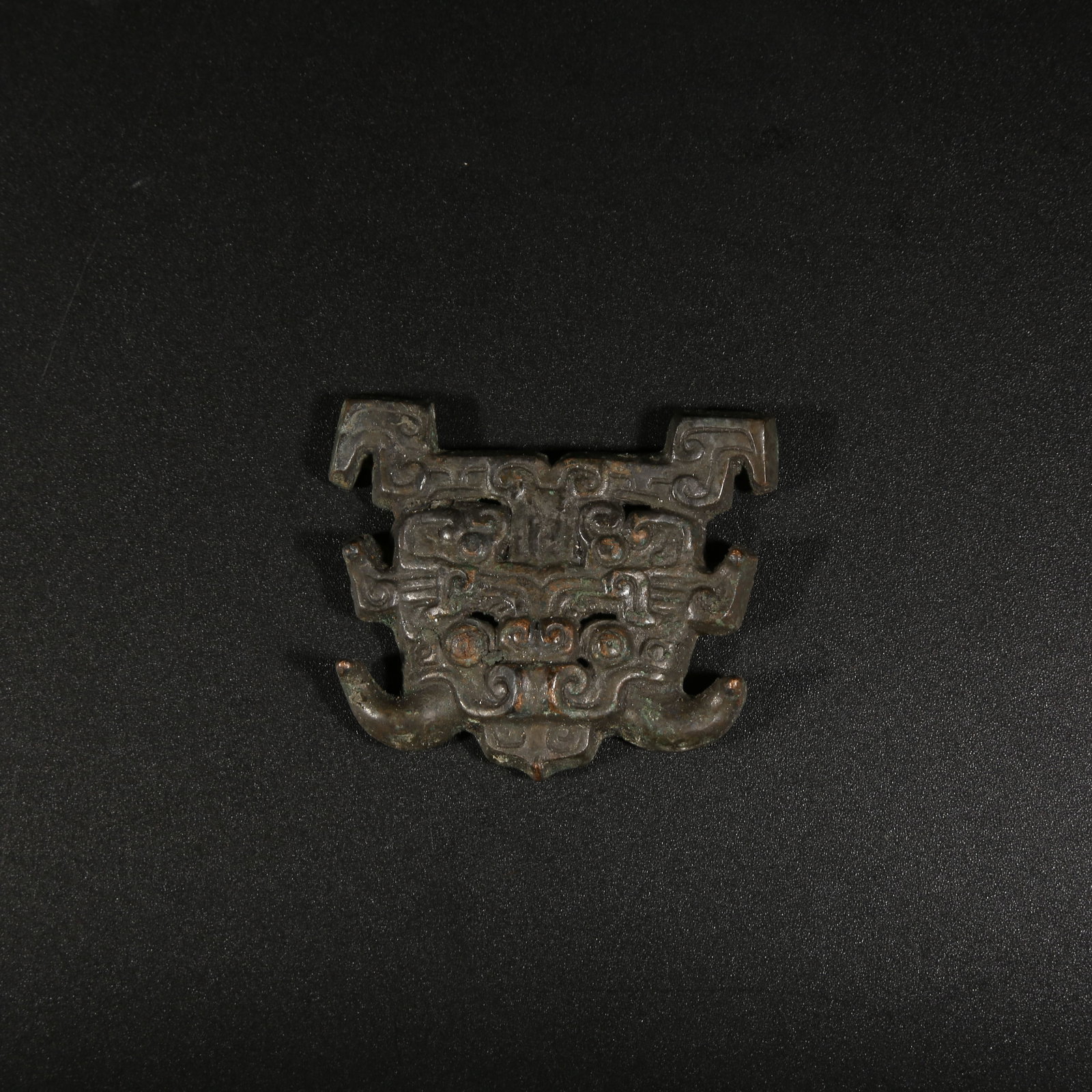 A BRONZE BEAST-FACE BELT ORNAMENT (1 of 9)