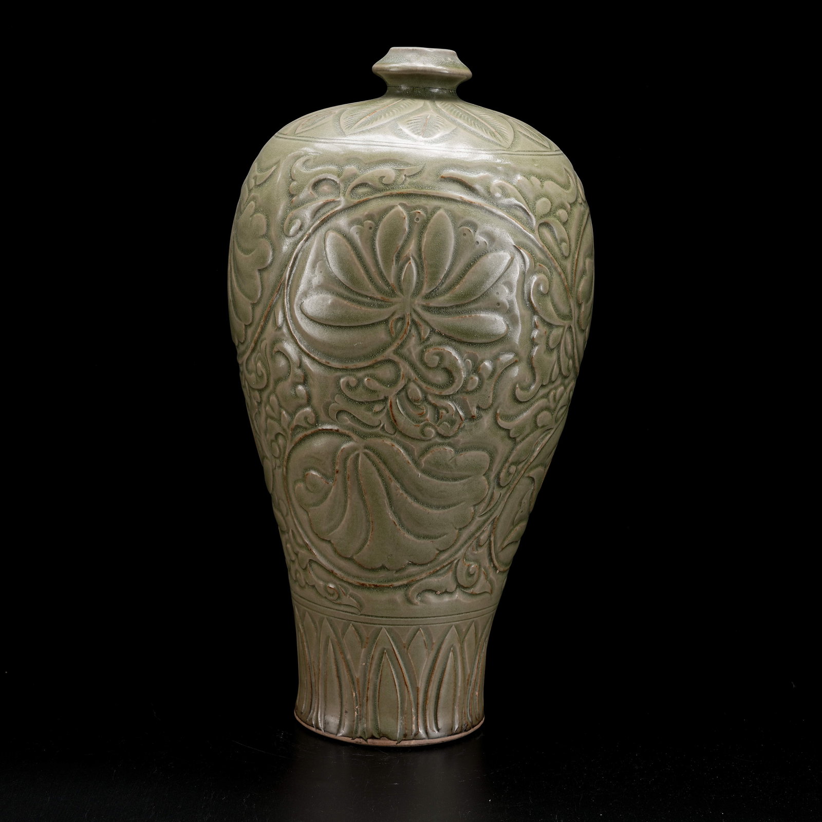 A YAOZHOU KILN CARVED PLUM BOTTLE (1 of 9)