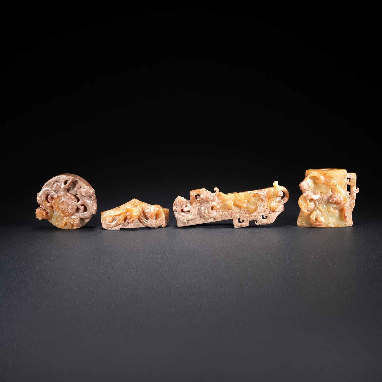 A HETIAN JADE CARVED SWORD ORNAMENT (SET) (1 of 10)