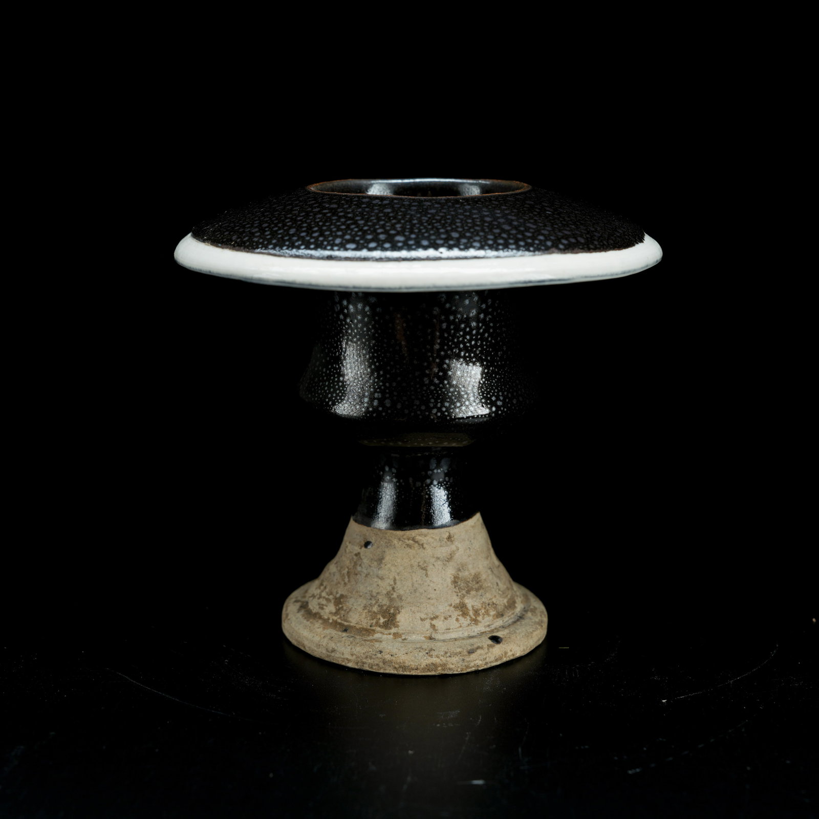 A OIL SPOT BLACK GLAZED FOLDED-RIM CANDLESTICK (1 of 9)
